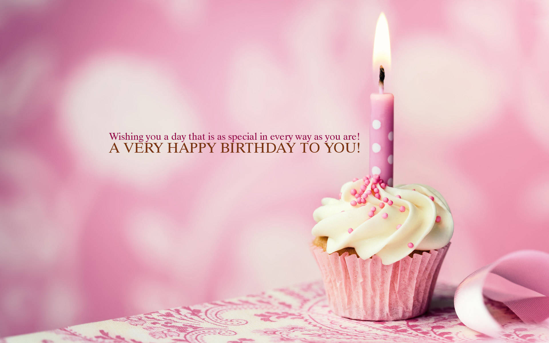 pink cupcake, white frosting, lit candle, Full HD Desktop Wallpaper