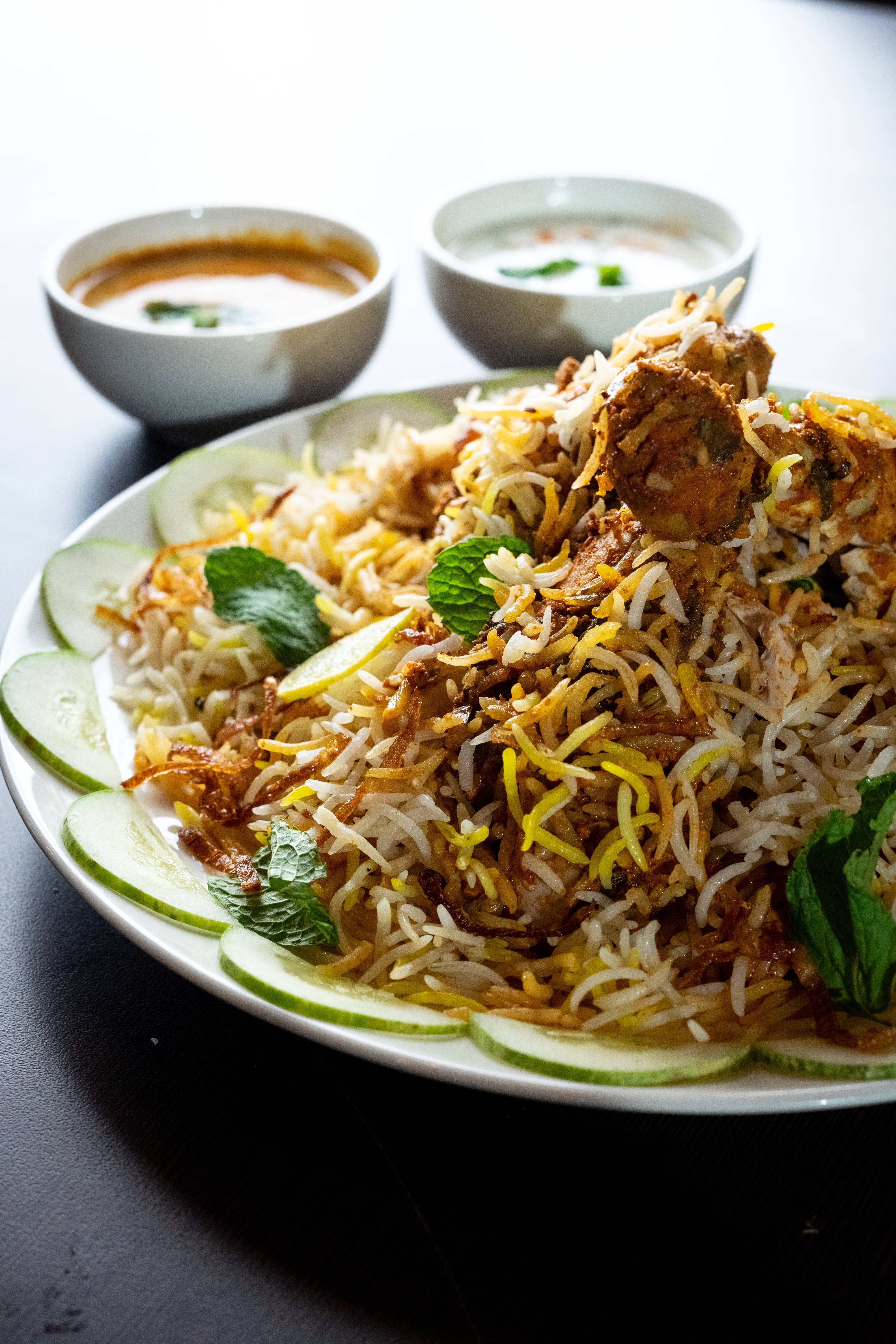 Chicken Biryani, cucumber slices, mint garnish, 5K Phone Wallpaper