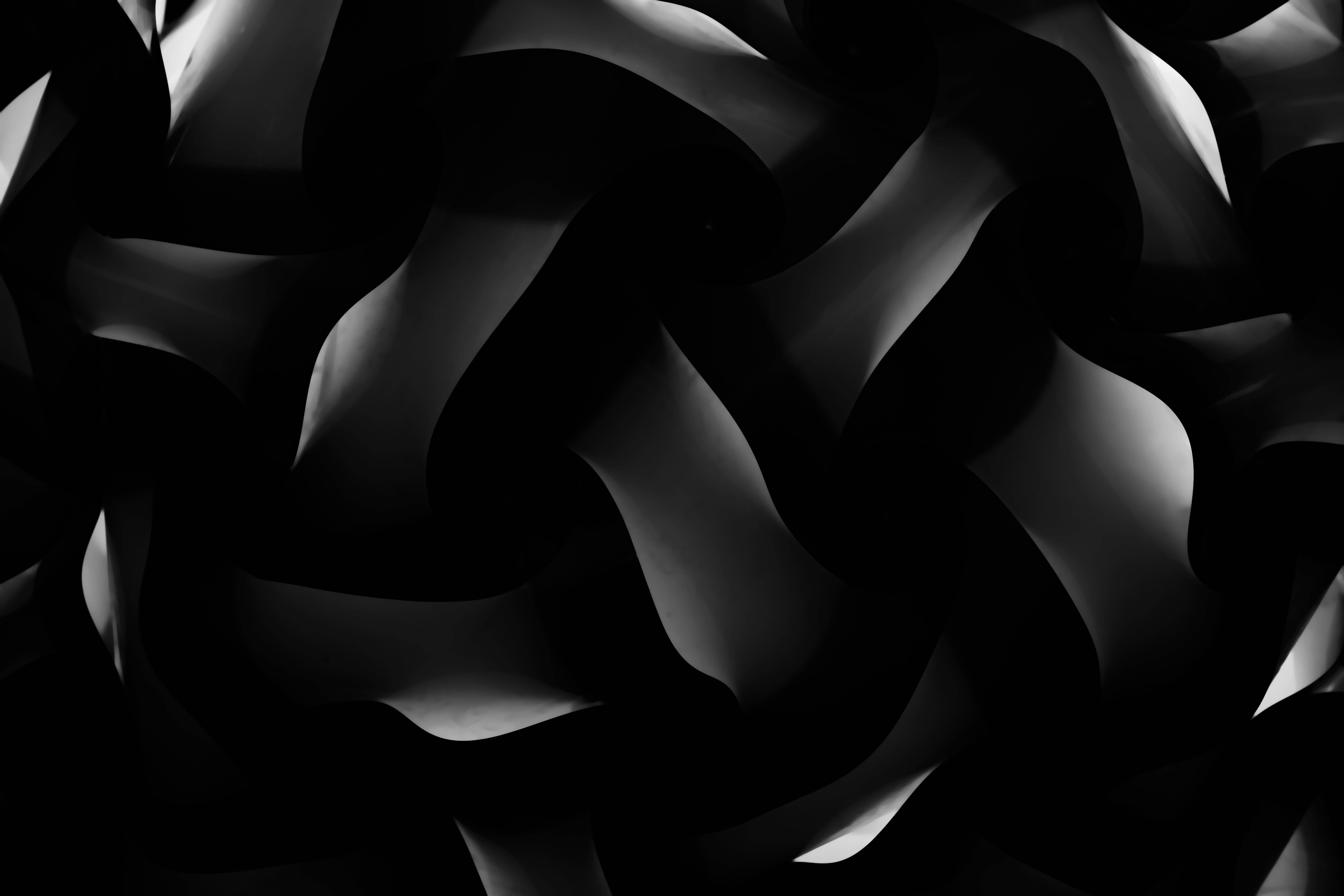 black textured background, monochrome abstract composition, flowing dark and light curves, 5K Desktop Wallpaper