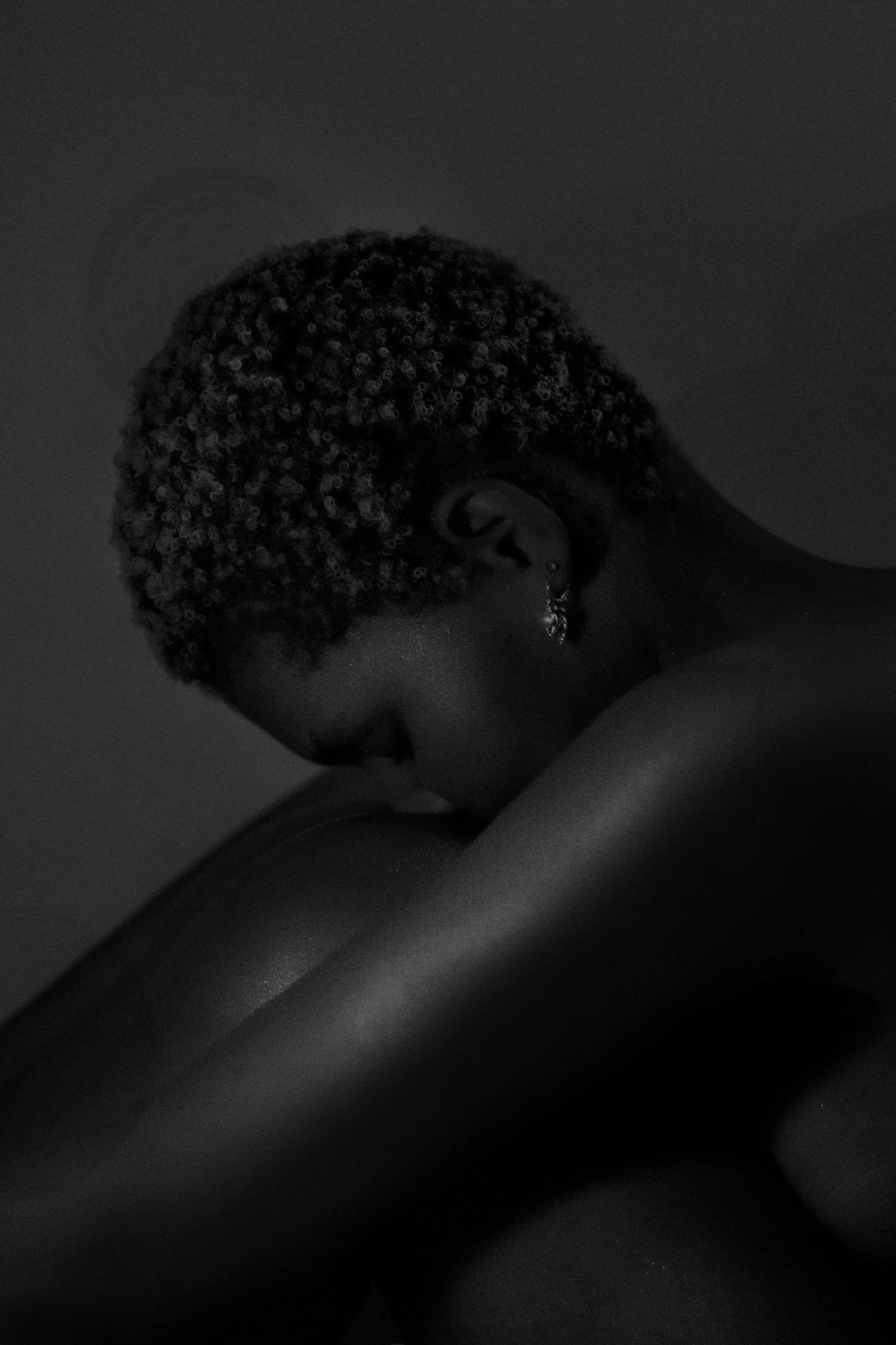 Black Aesthetic Tumblr iPhone, short curly hair, dimly lit, 2K Phone Wallpaper