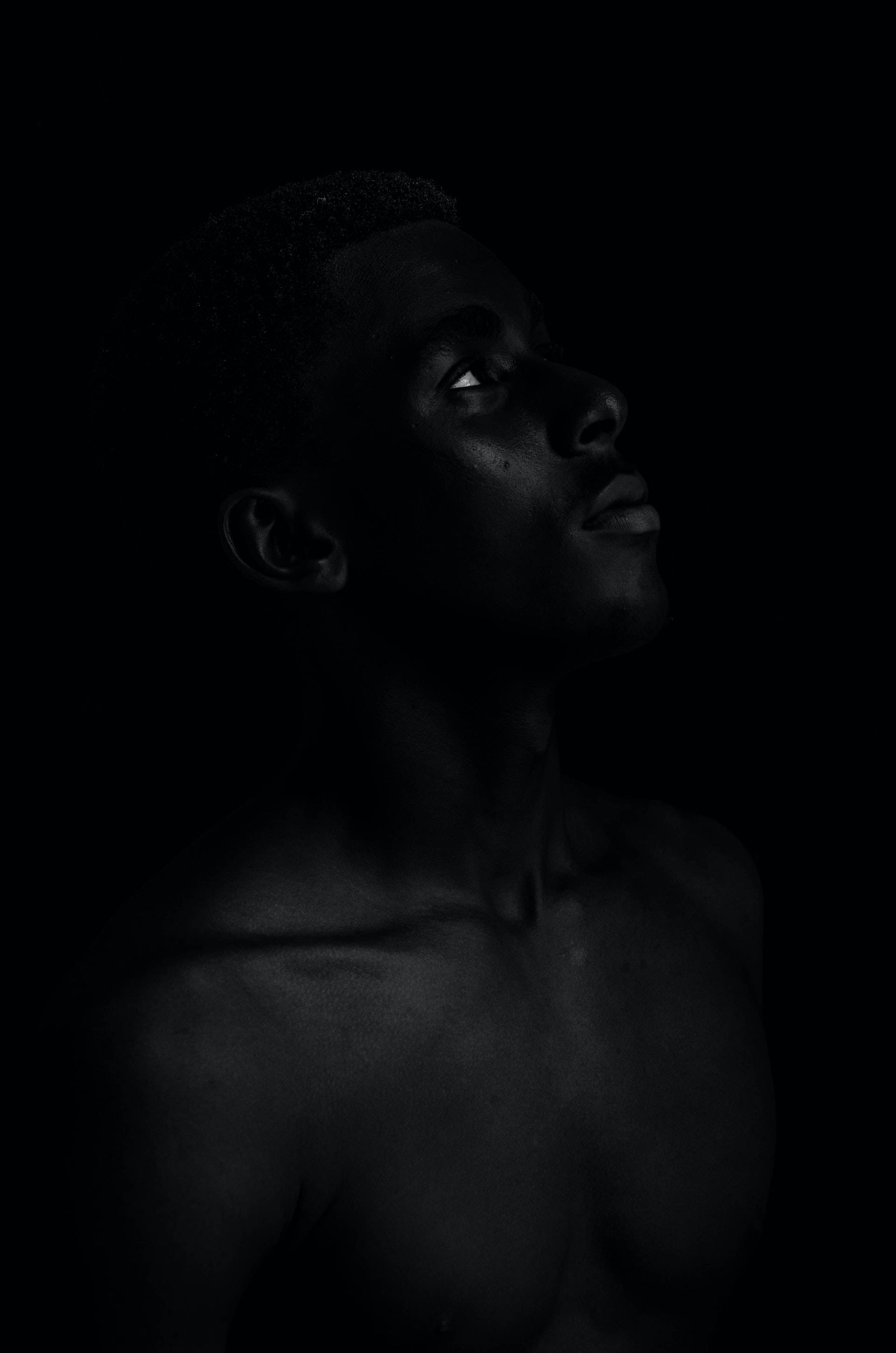Black Aesthetic Tumblr iPhone, shirtless man, upward gaze, 2K Phone Wallpaper