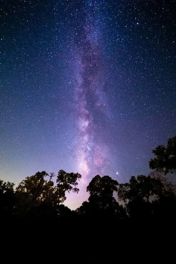 Black and Blue iPhone, Milky Way galaxy, vibrant purples, SD Phone Wallpaper