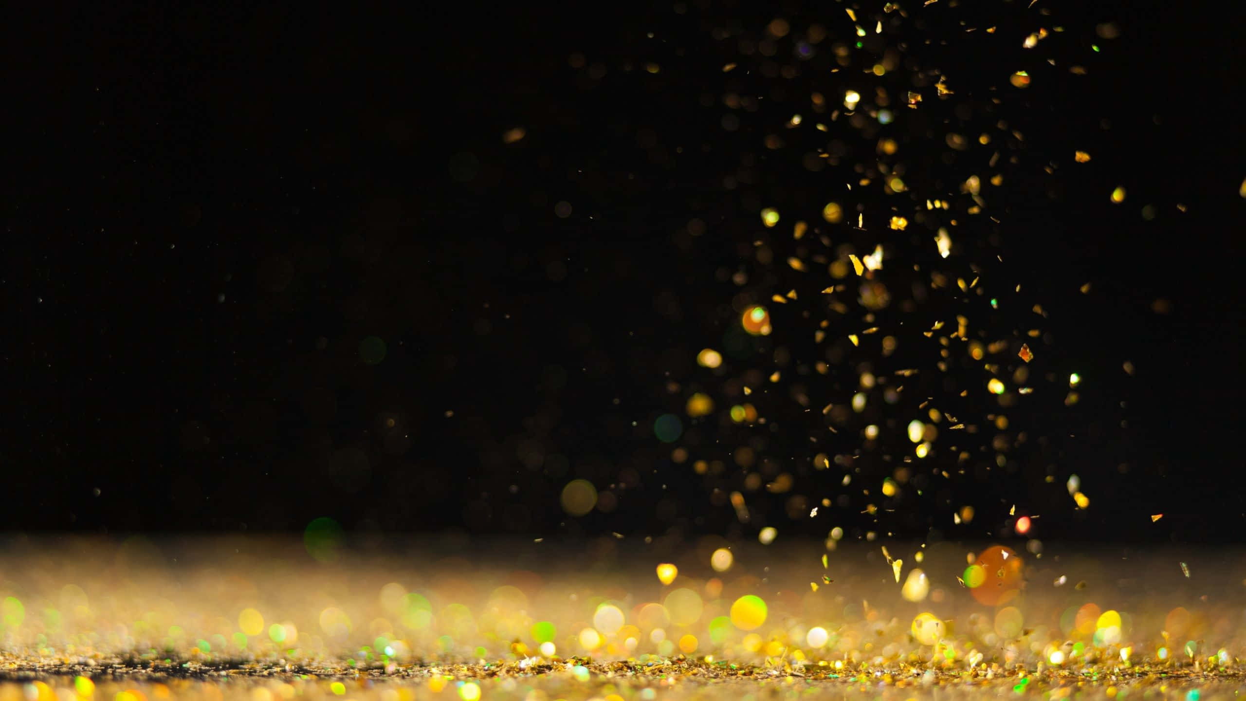 Black And Gold Glitter, golden glitter particles, deep black background, 2K Desktop Wallpaper