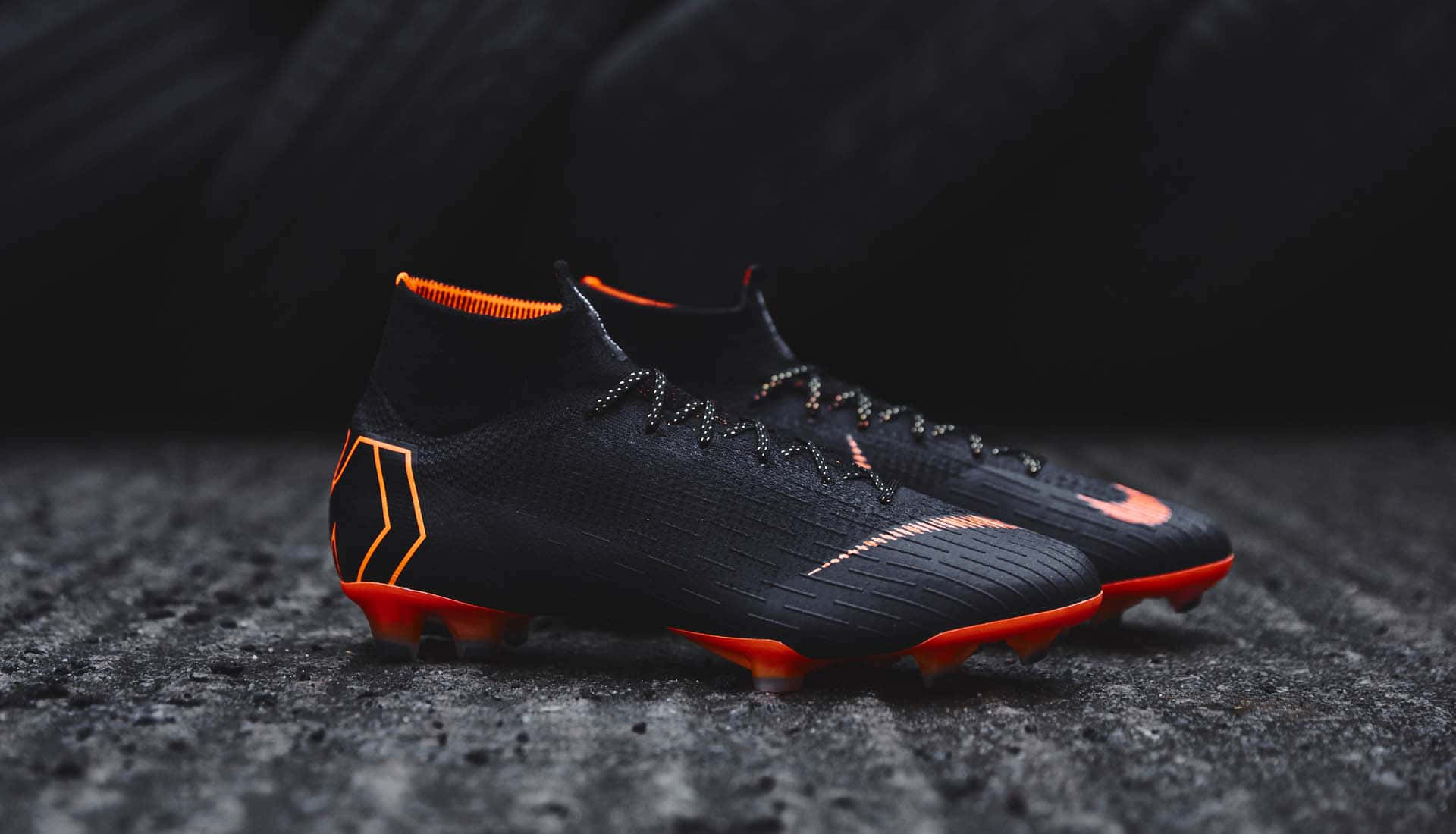 black soccer cleats, vibrant orange accents, studs, Full HD Desktop Wallpaper