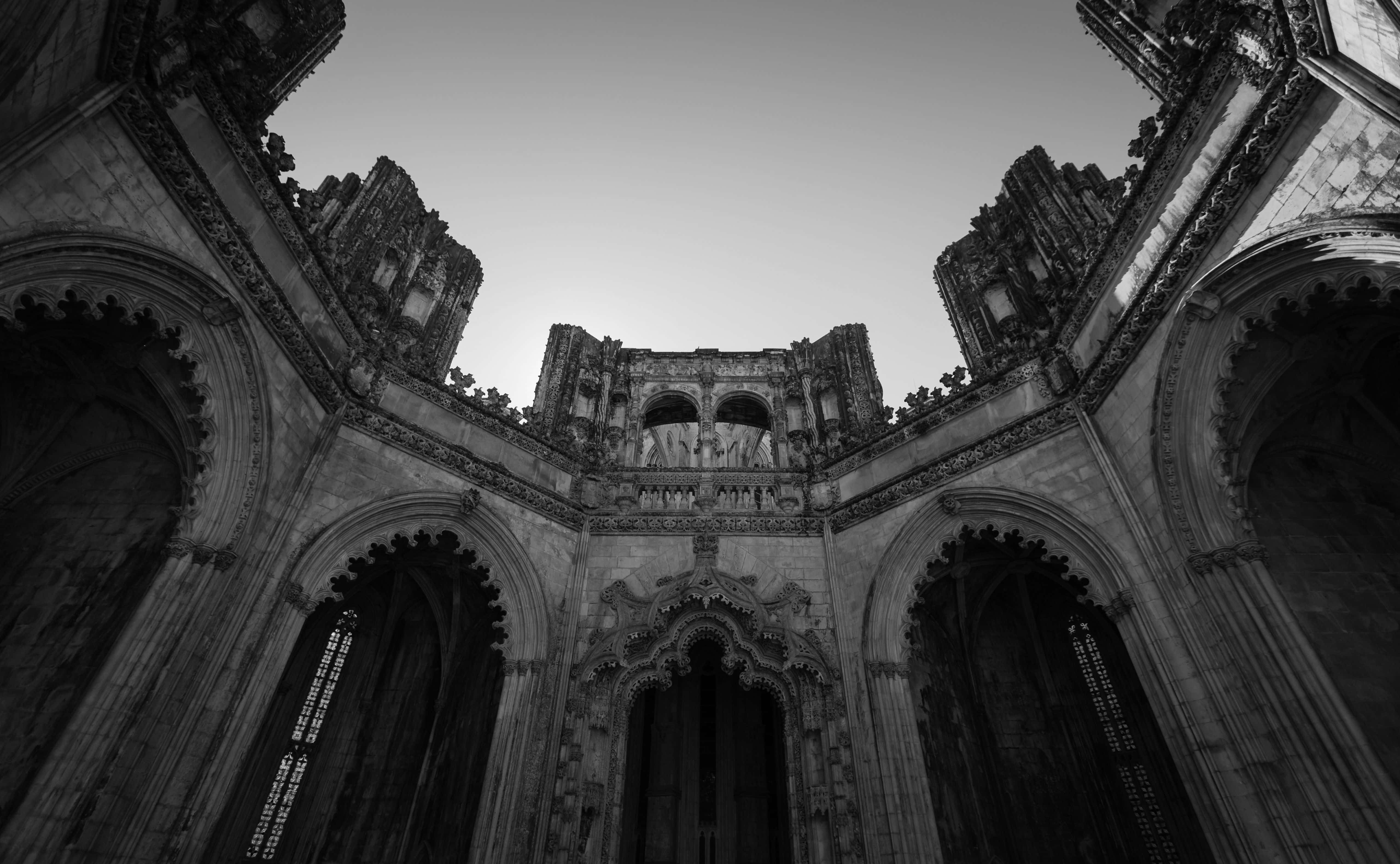 black and white architecture, ruined gothic cathedral, intricate stone arches, 5K Desktop Wallpaper