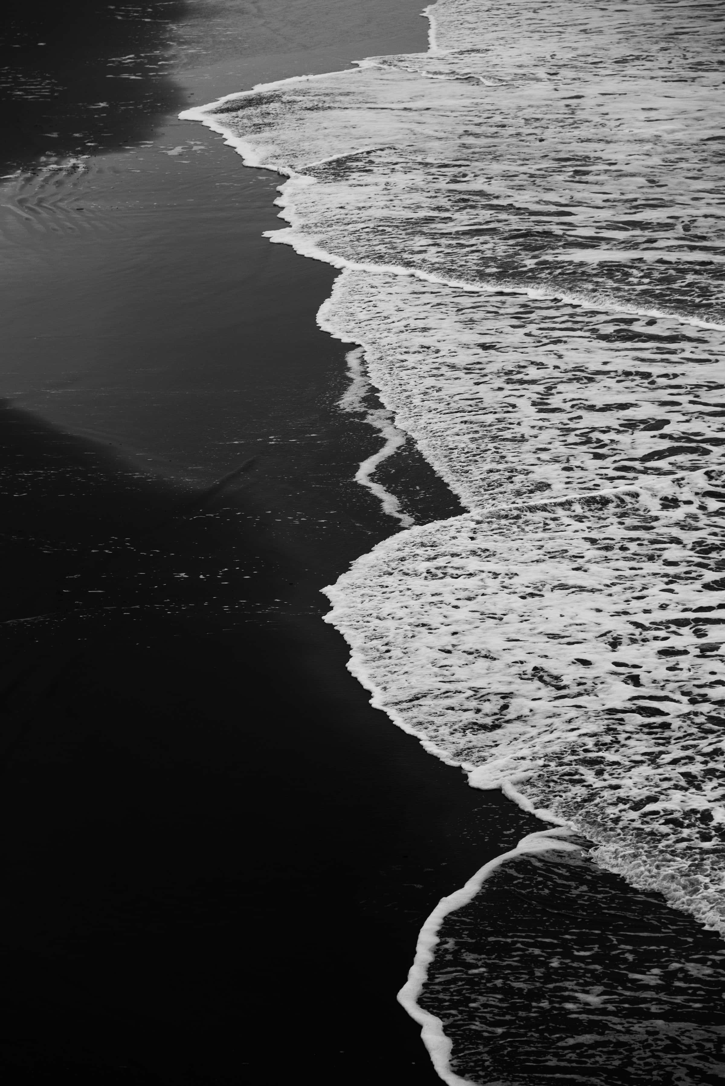 Black And White Beach, foamy ocean waves, dark volcanic sand beach, 2K Phone Wallpaper