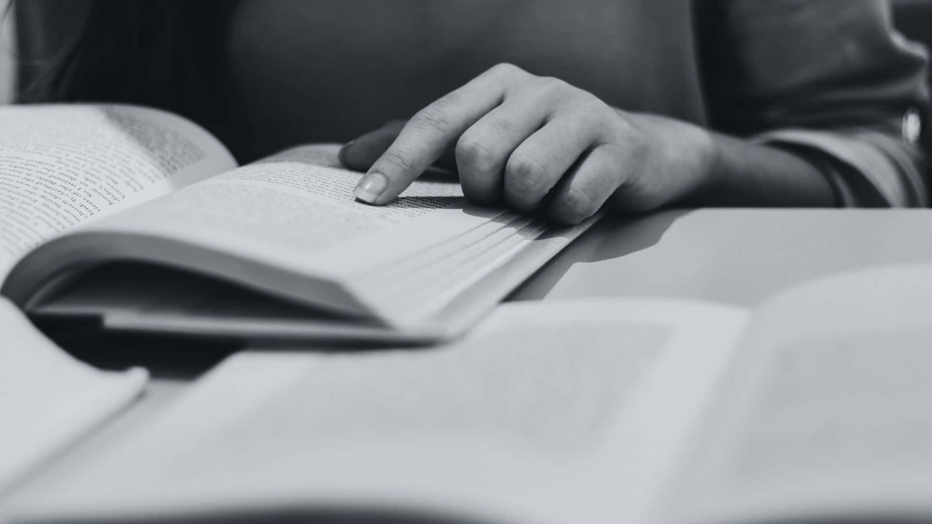 black and white book, table, person's hand, Full HD Desktop Wallpaper
