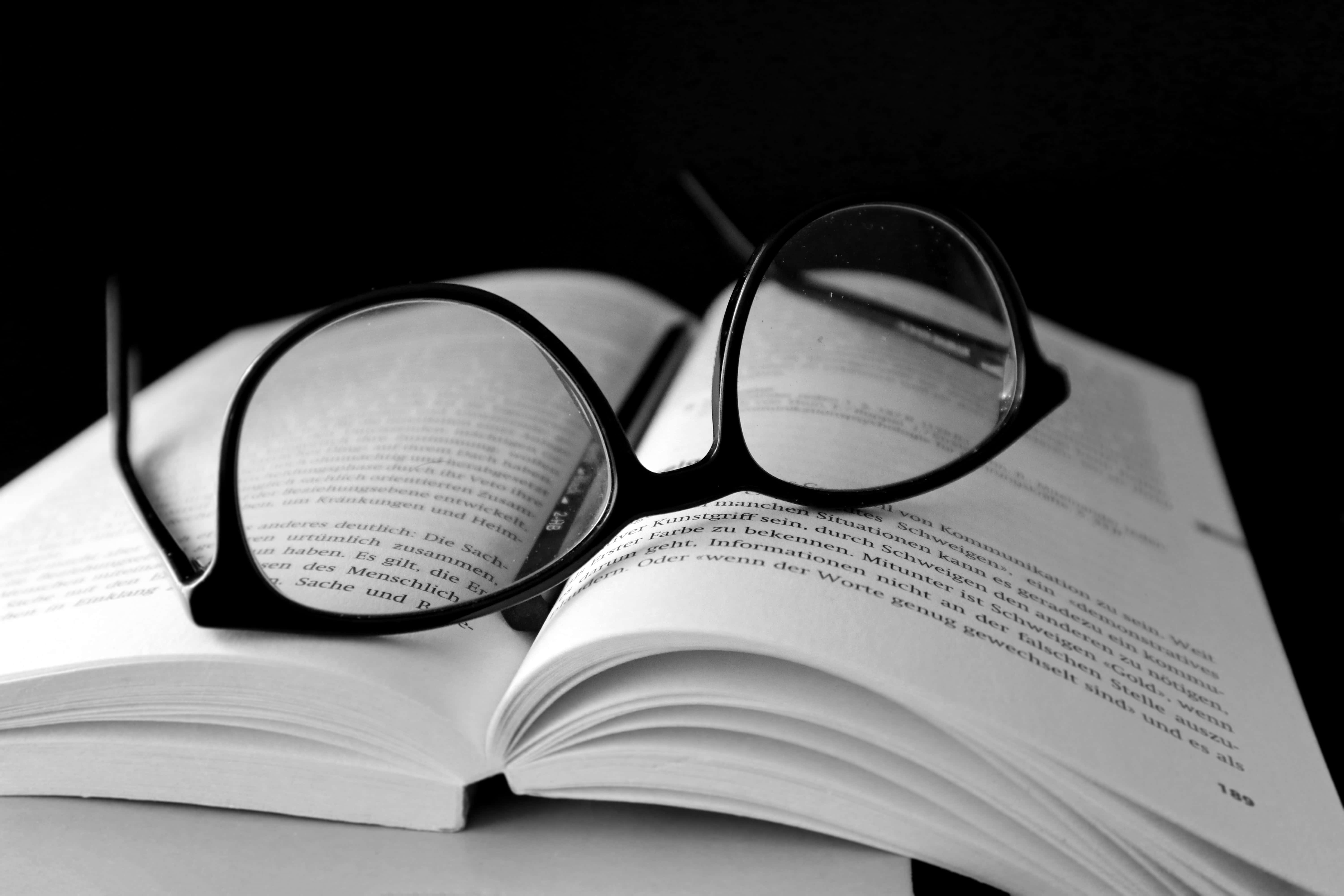 black and white book, black-rimmed glasses, open book, 5K Desktop Wallpaper