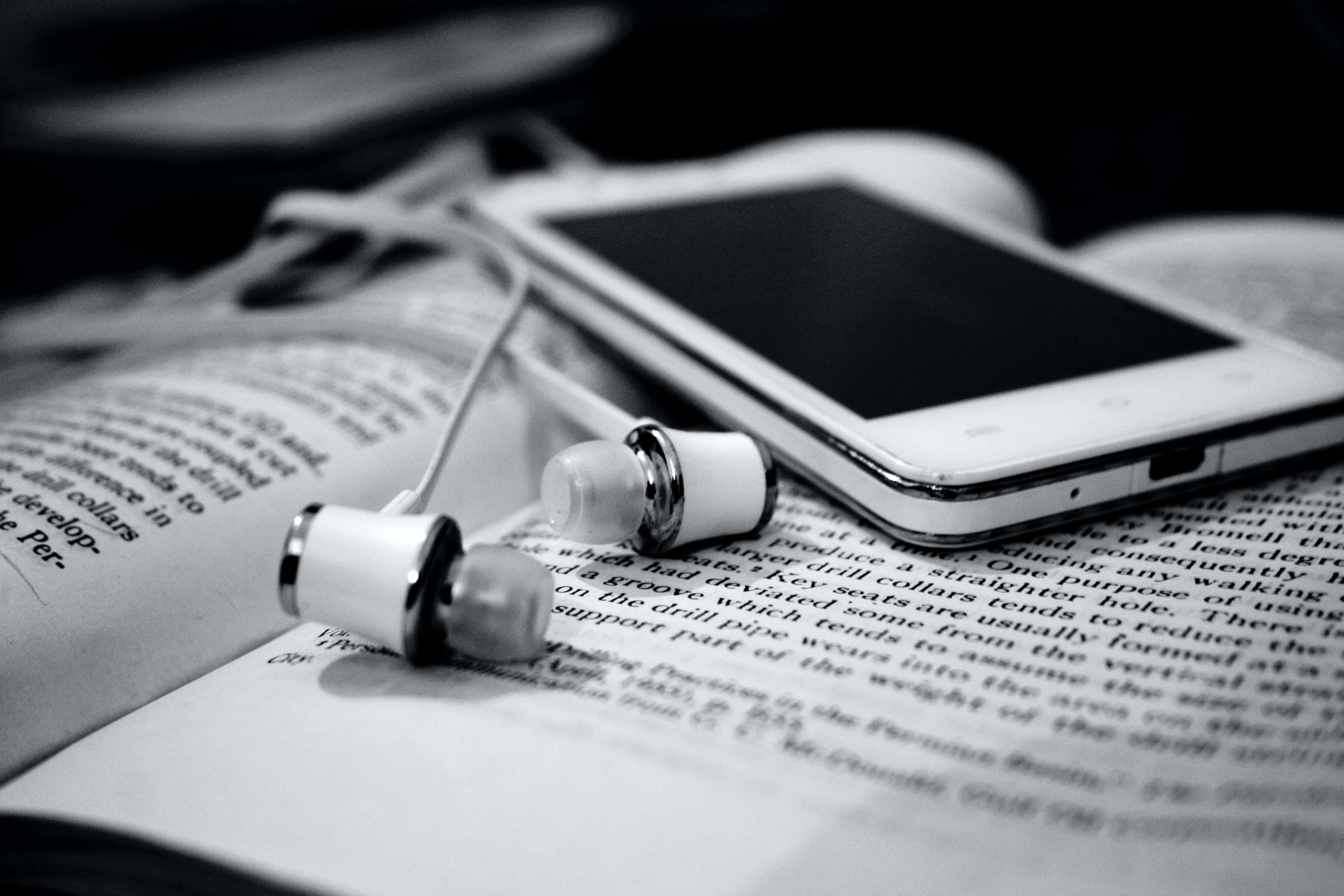 black and white book, open book, wooden surface, 4K Desktop Wallpaper