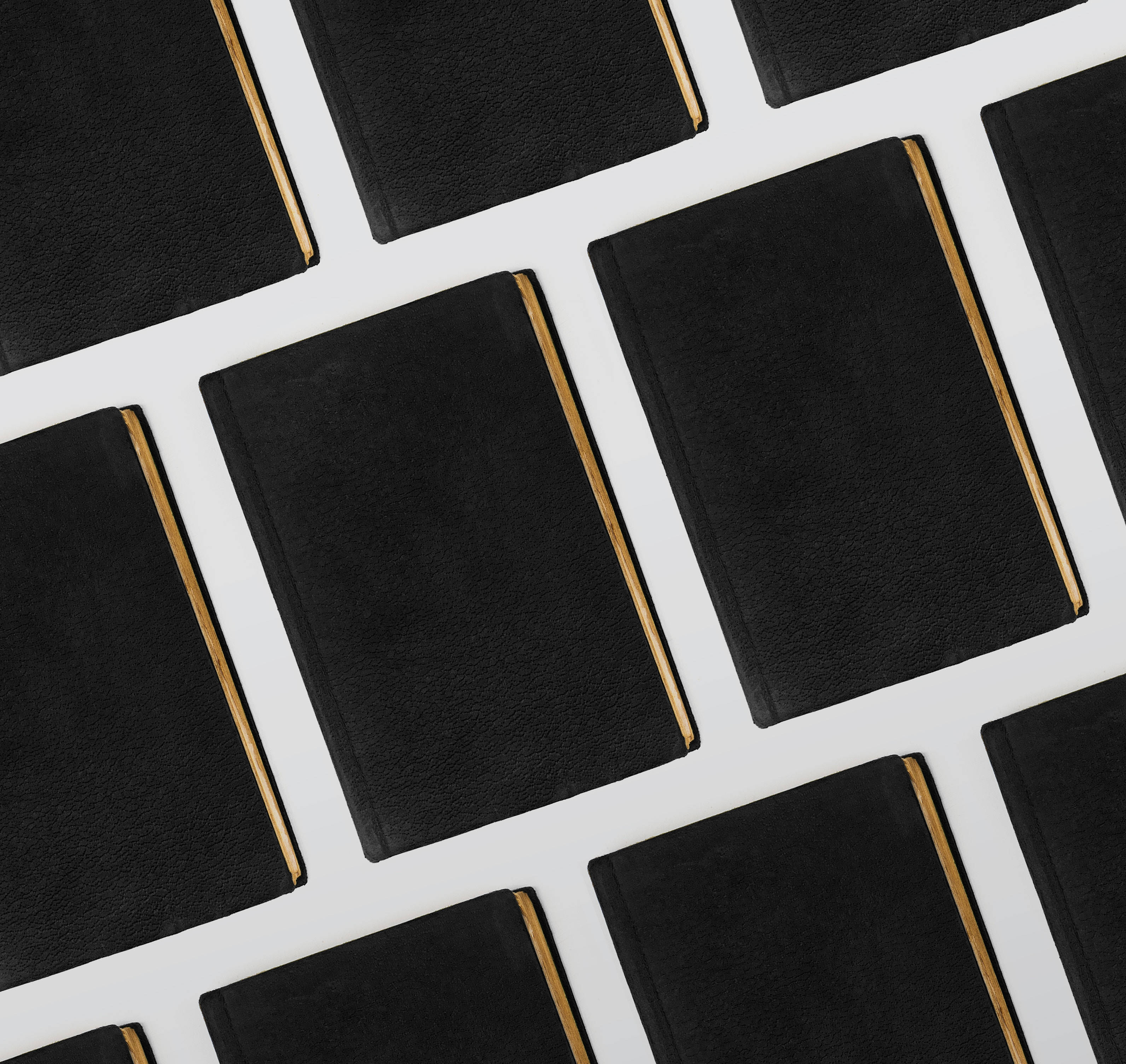black leather notebooks, gold edges, clean geometric pattern, 2K Desktop Wallpaper
