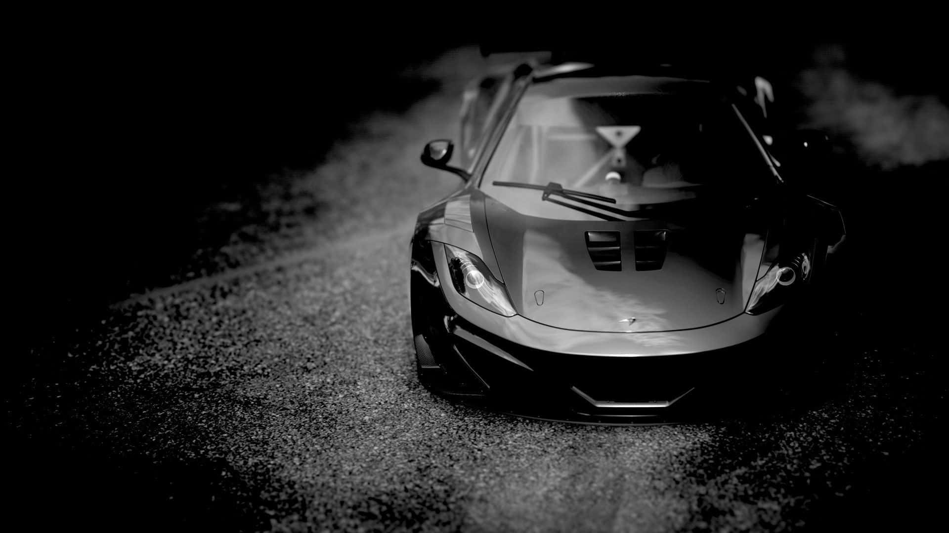 Sleek Sports Car, Gravel Road, Misty Darkness, Full HD Desktop Wallpaper