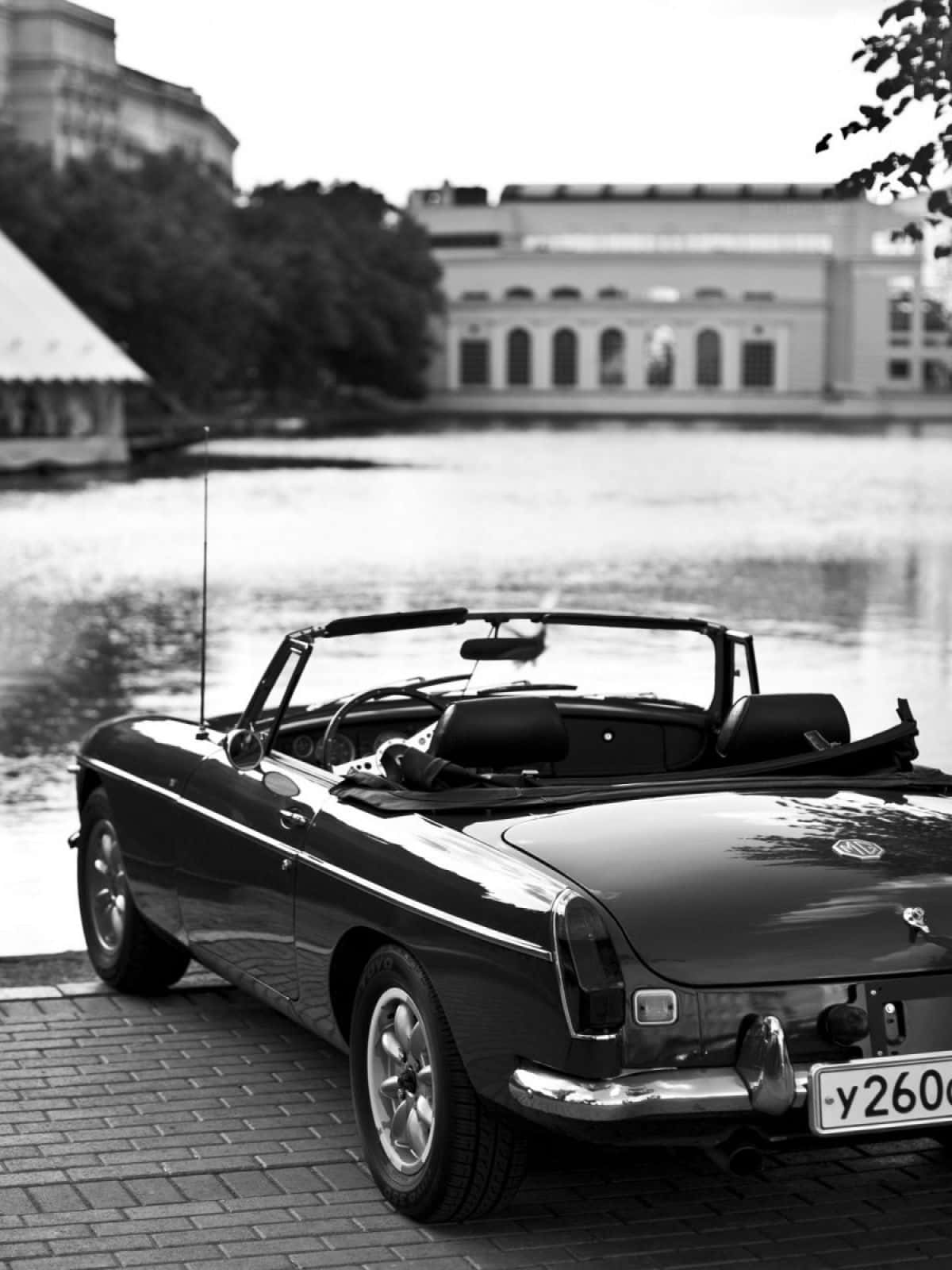 black convertible, brick quay, calm water, HD Phone Wallpaper