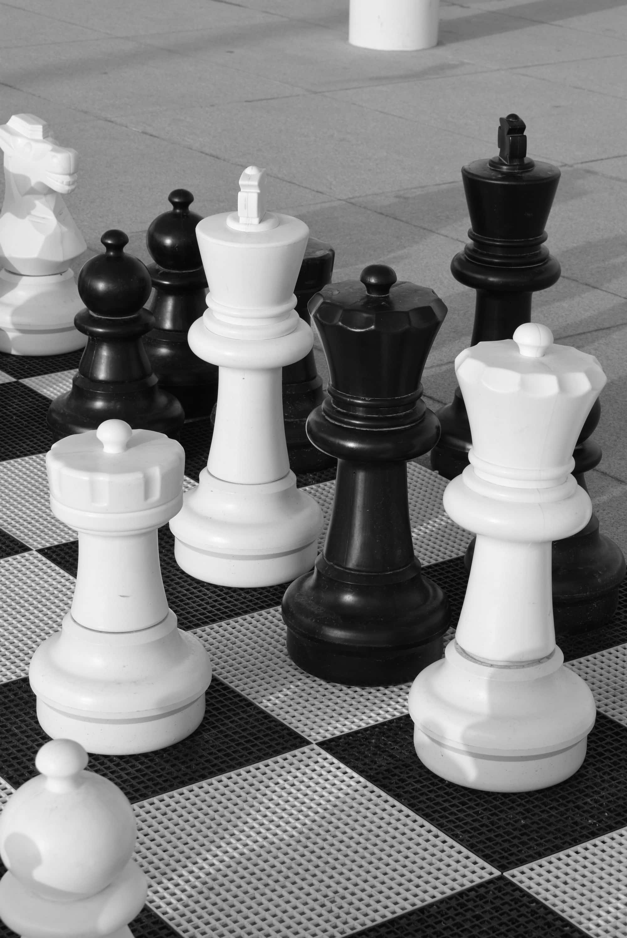 black and white chess, giant chess pieces, checkered outdoor board, 2K Phone Wallpaper