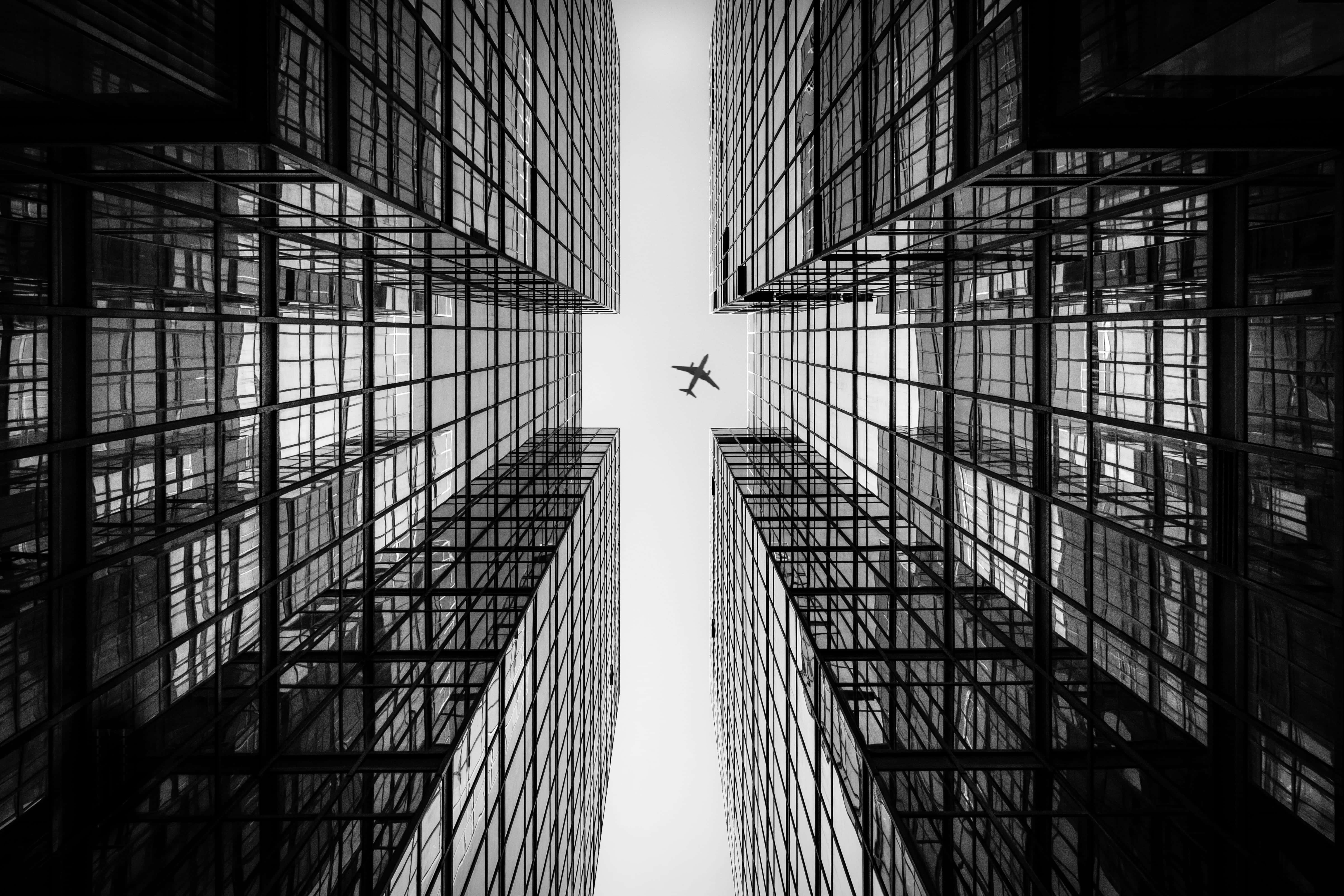 Black and White City, low-angle shot, plane, 5K Desktop Wallpaper