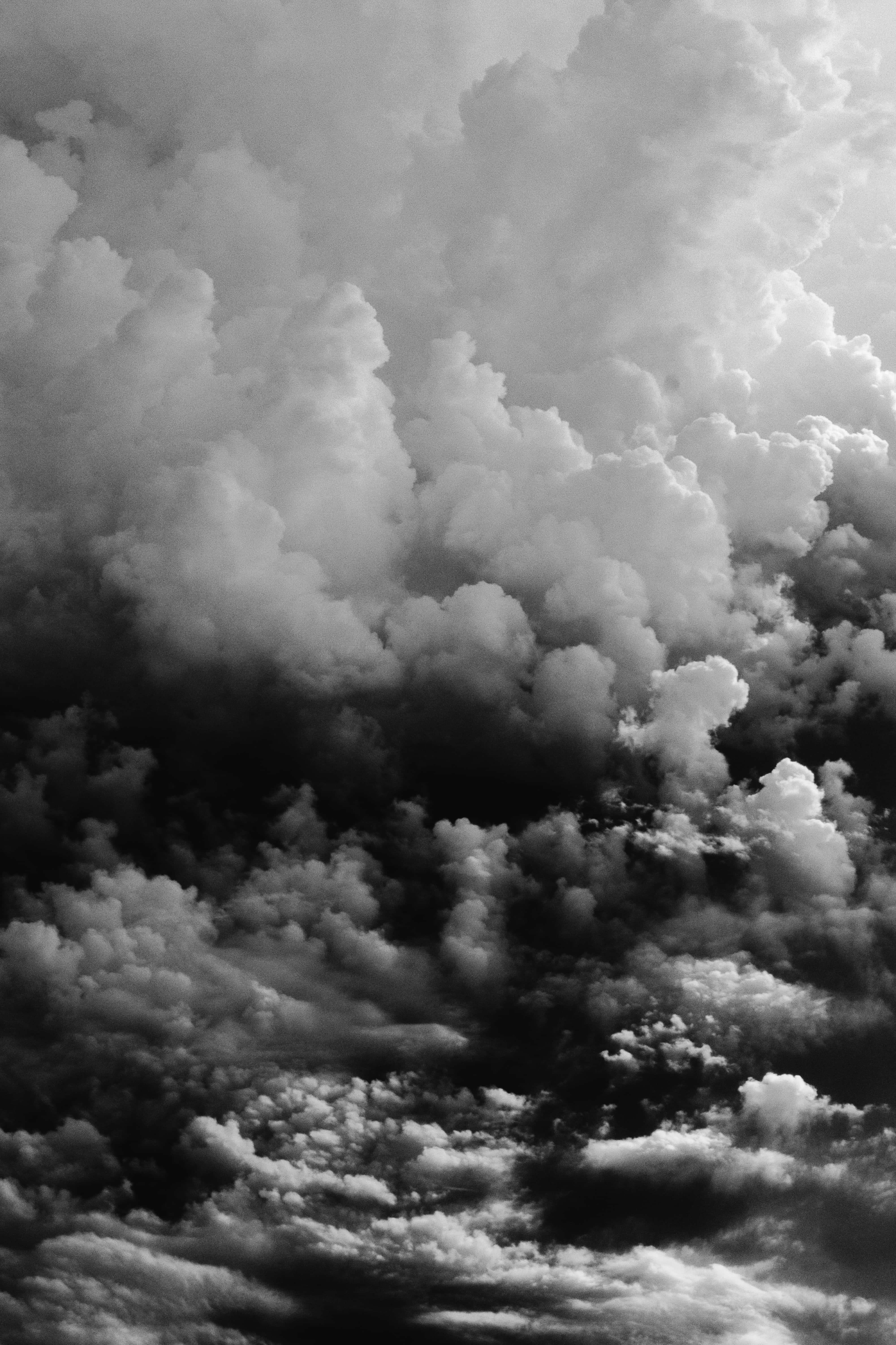 black and white photo, clouds in the sky, dramatic monochrome clouds, 5K Phone Wallpaper