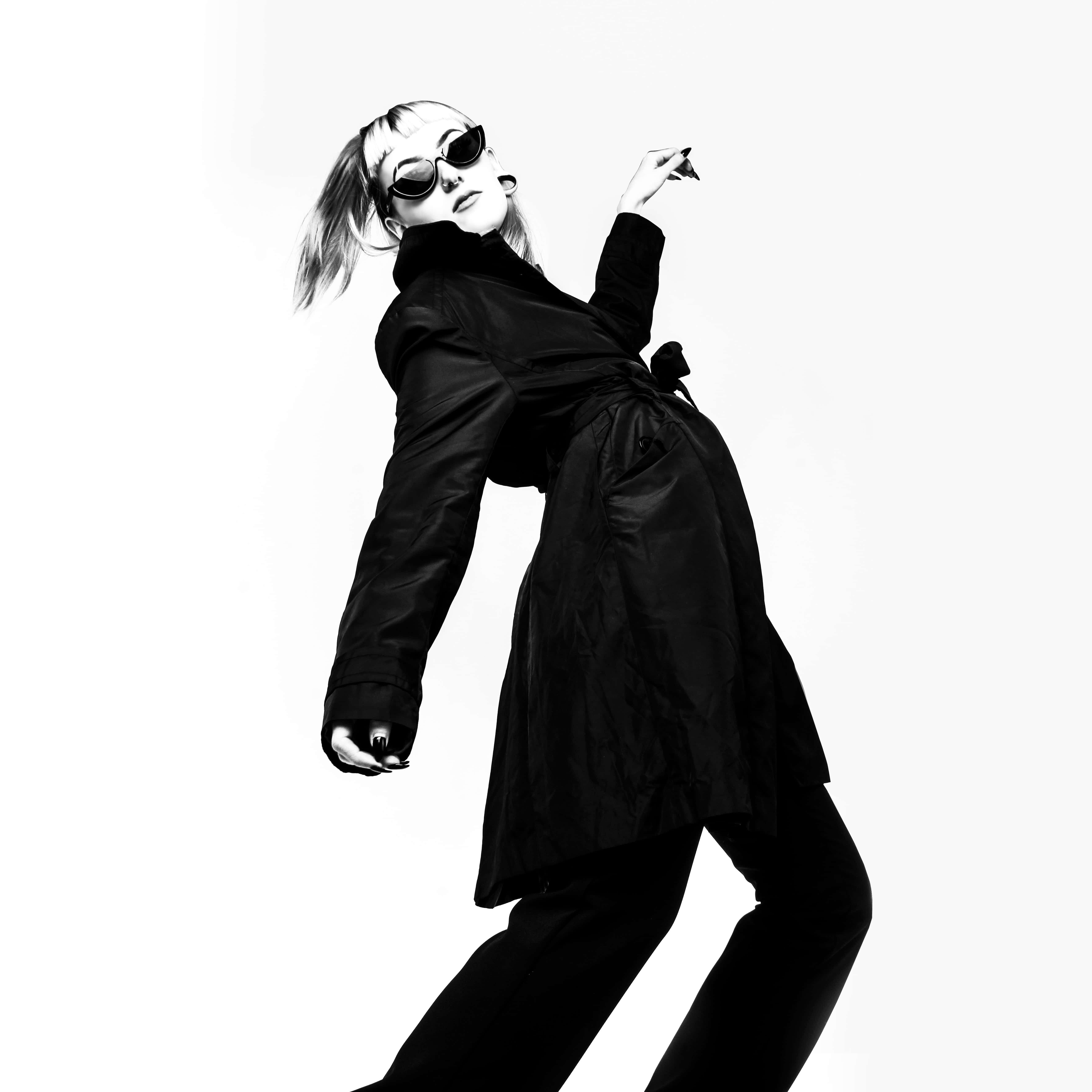 black trench coat, sunglasses, stark white background, 5K Desktop Wallpaper