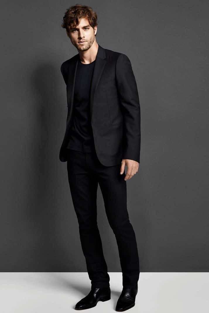 black suit, minimalist gray backdrop, soft studio lighting, SD Phone Wallpaper