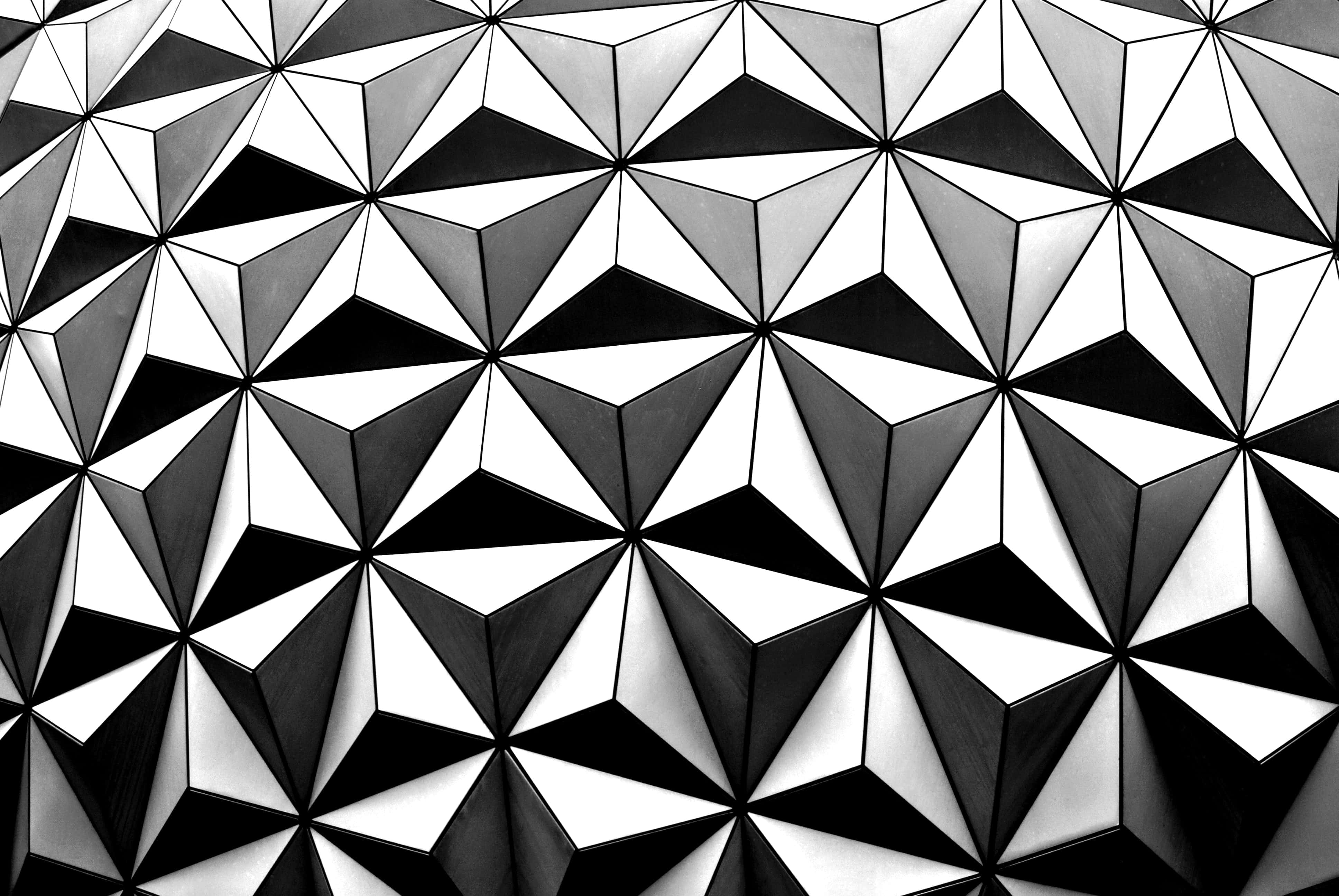 black and white geometric pattern, repeating triangular facets, dynamic 3D optical illusion, 4K Desktop Wallpaper