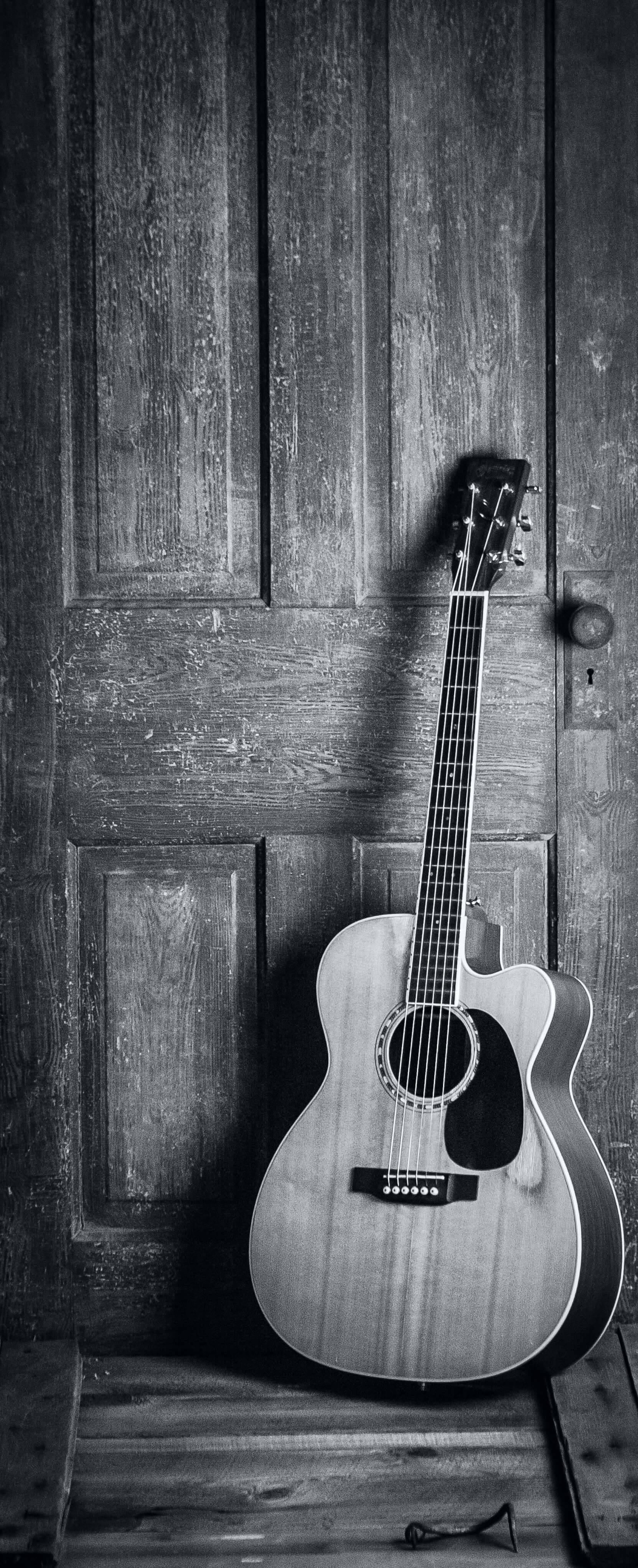 acoustic guitar, black and white, weathered wooden door, 4K Phone Wallpaper