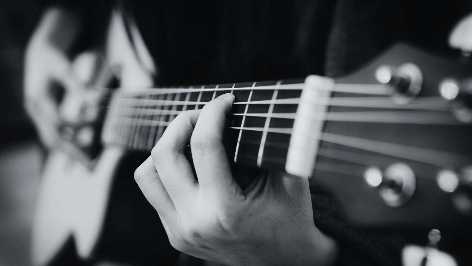 black and white guitar, acoustic guitar neck, hand pressing strings, Full HD Desktop Wallpaper