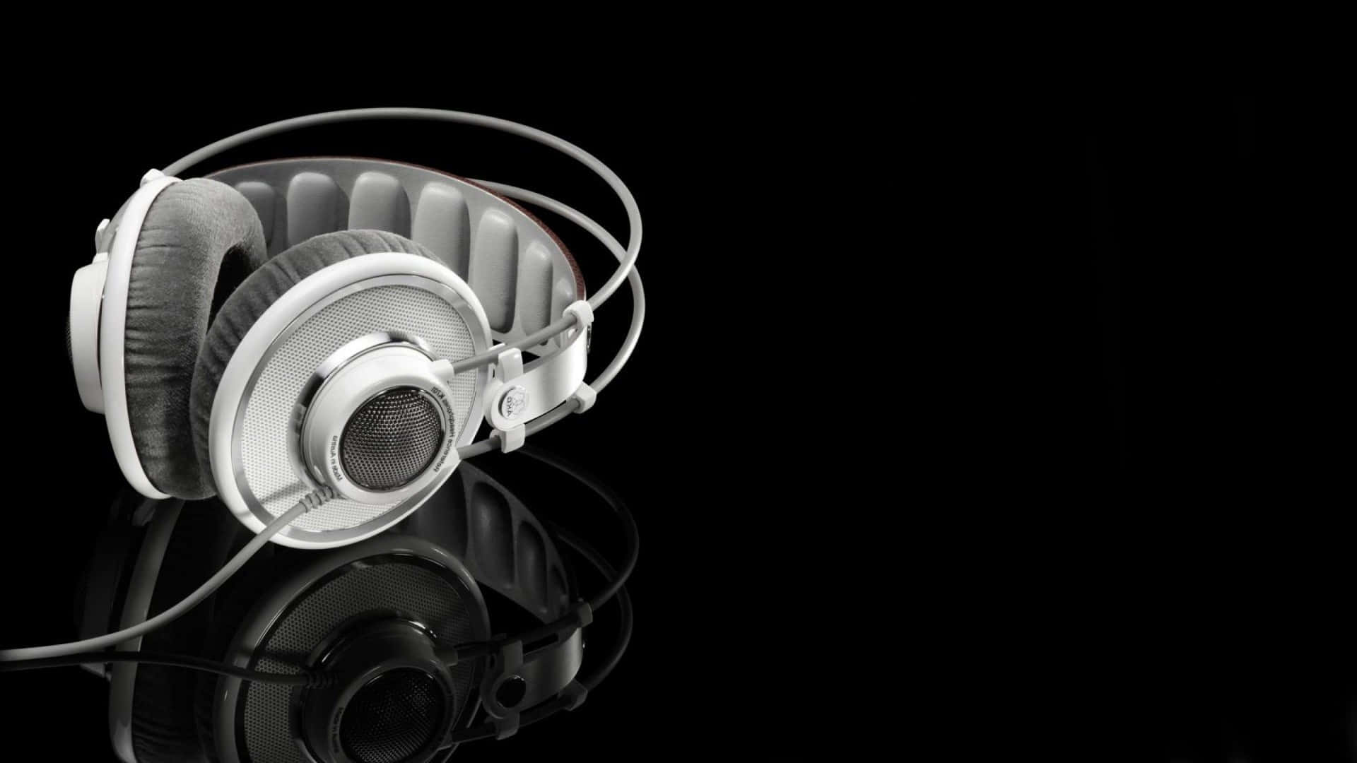 black and white music, sleek silver over-ear headphone, reflective black surface, Full HD Desktop Wallpaper