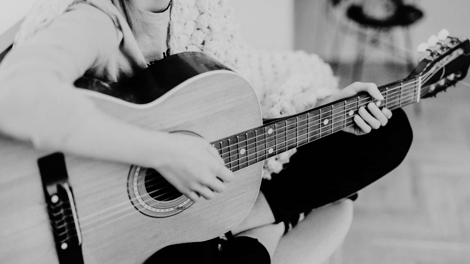 black and white guitar, acoustic guitar, cozy monochrome indoor setting, Full HD Desktop Wallpaper