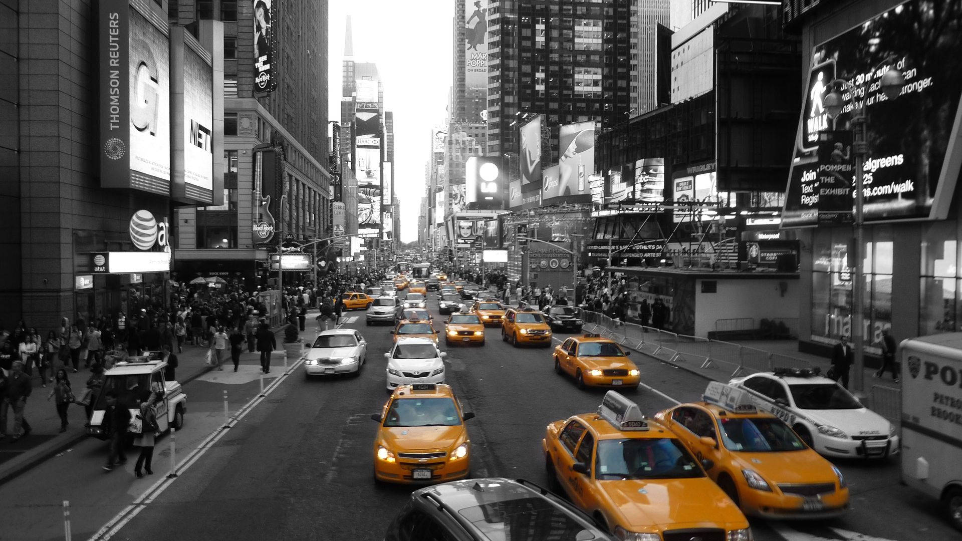 New York City street, vibrant yellow taxis, black and white urban backdrop, Full HD Desktop Wallpaper