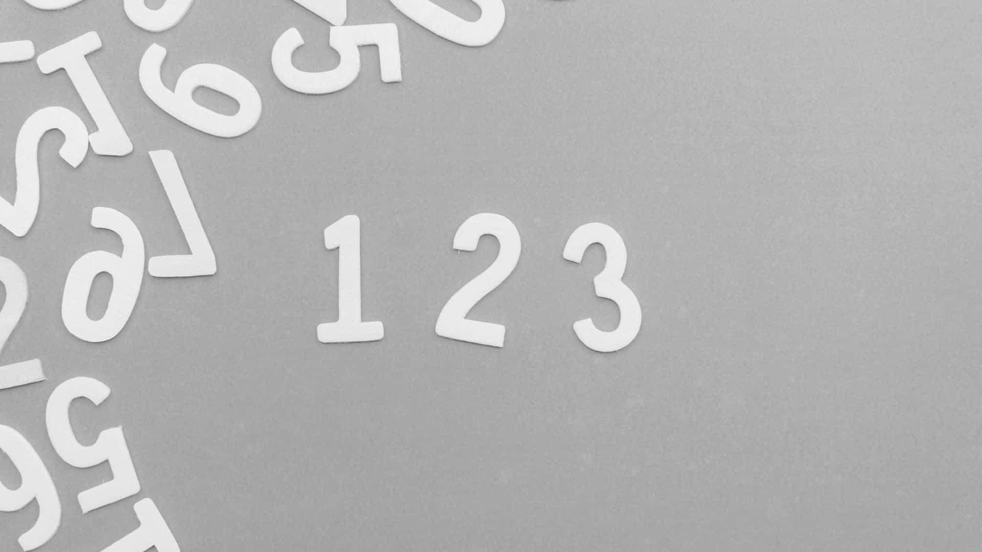 white cutout numbers, textured gray surface, 123 prominently centered, Full HD Desktop Wallpaper