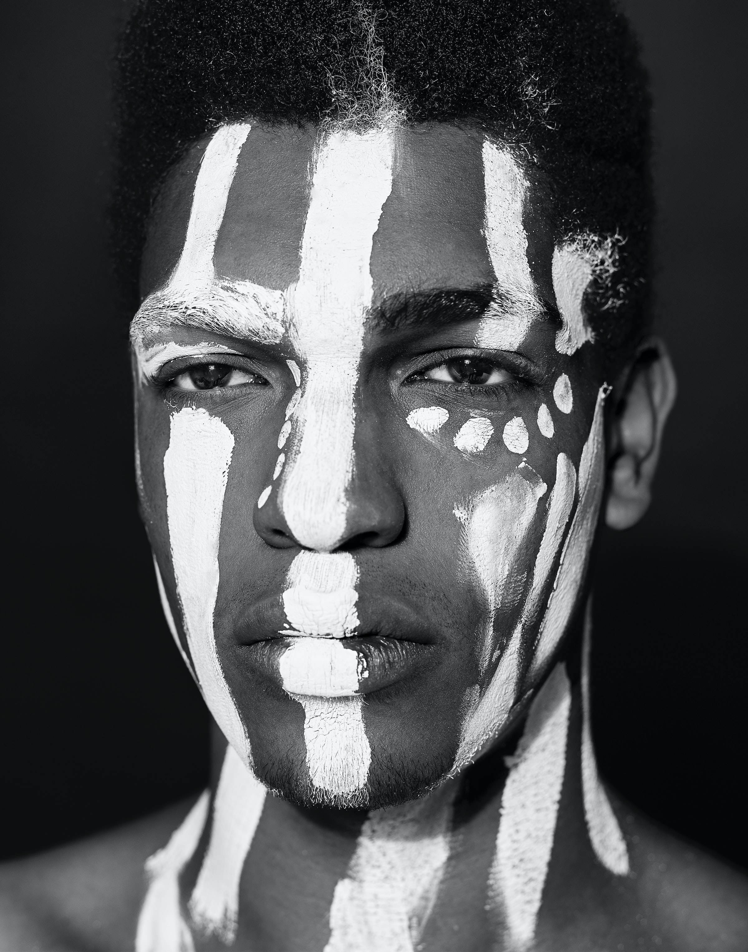 painted face, black and white portrait, white paint streaks, 2K Phone Wallpaper