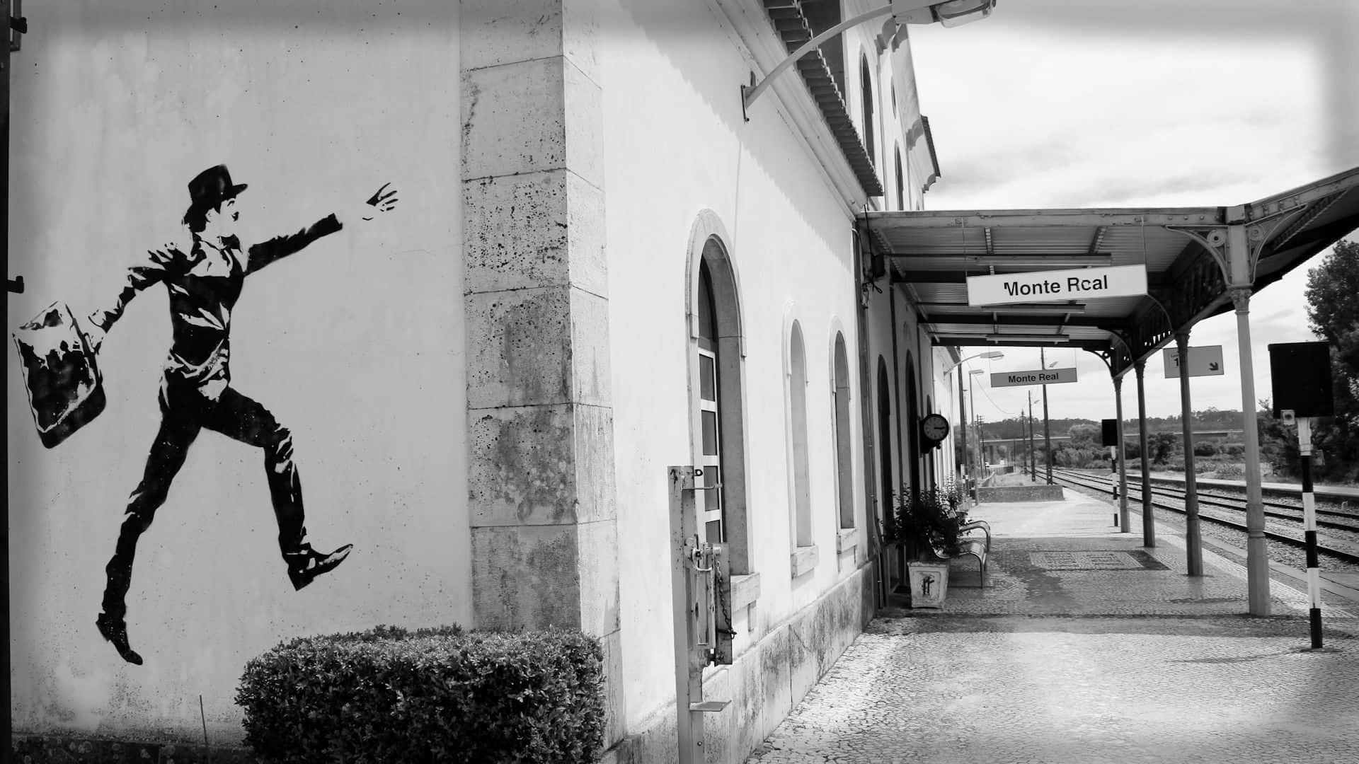 black and white mural, leaping man with a suitcase, train station wall, Full HD Desktop Wallpaper