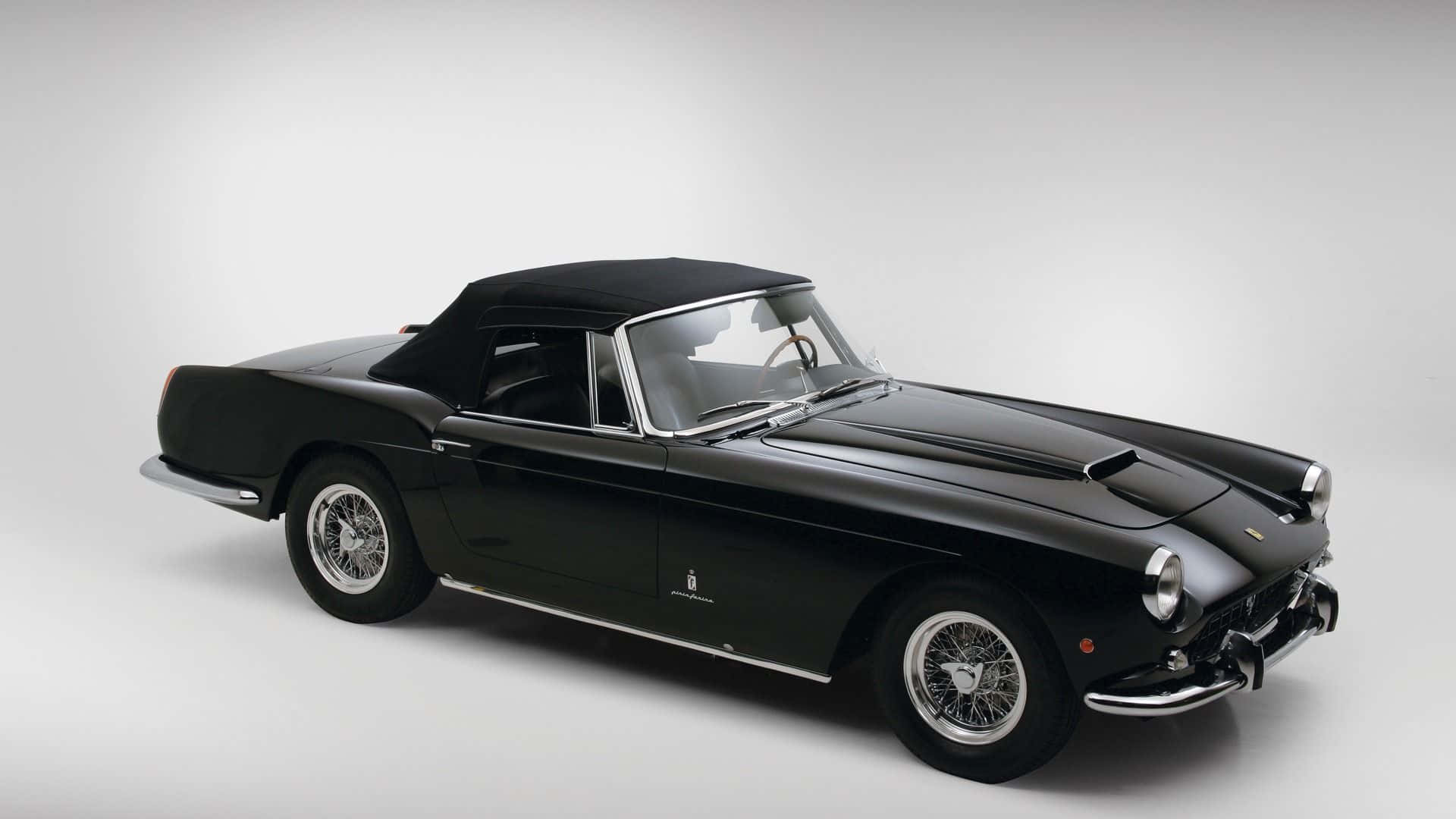 black vintage convertible sports car, chrome accents, wire wheels, Full HD Desktop Wallpaper