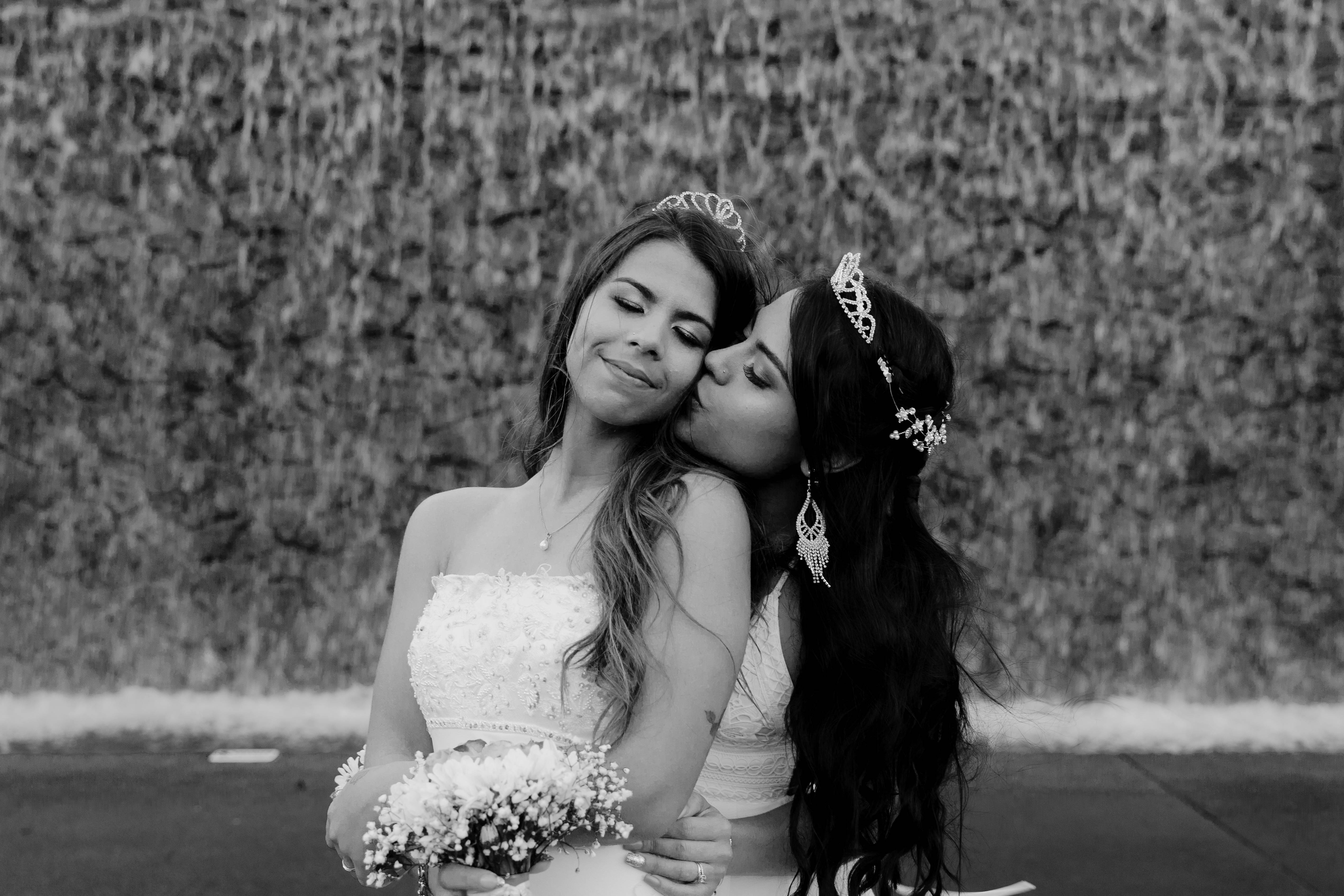 black and white lesbian wedding, white dresses, textured stone wall, 4K Desktop Wallpaper