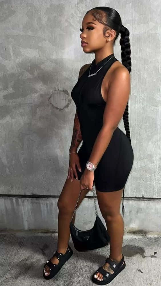 black sleeveless romper, braided hair, textured concrete wall, SD Phone Wallpaper
