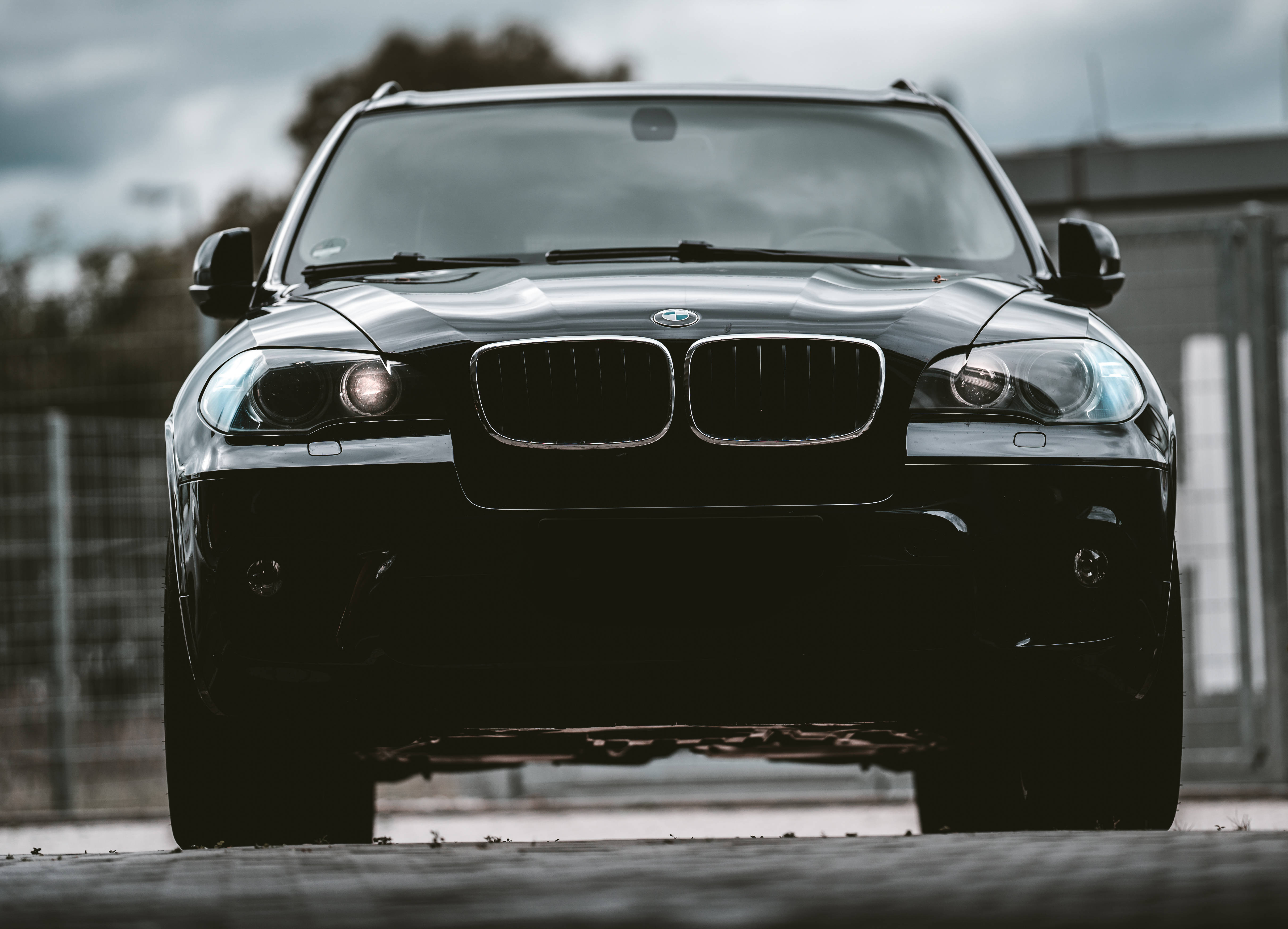 Black BMW, SUV, glowing headlights, 4K Desktop Wallpaper