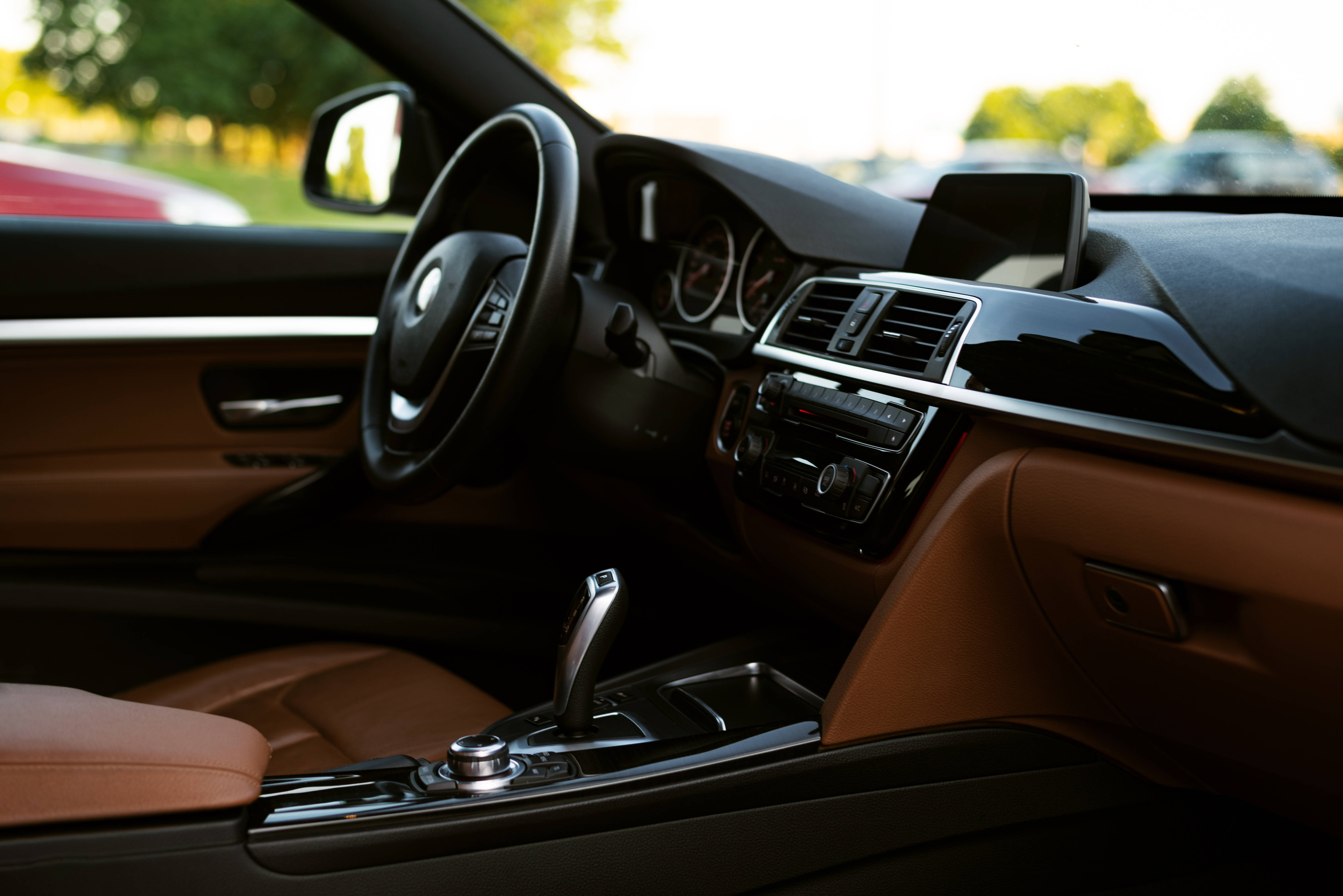 Black BMW, tan leather seats, black dashboard, 5K Desktop Wallpaper