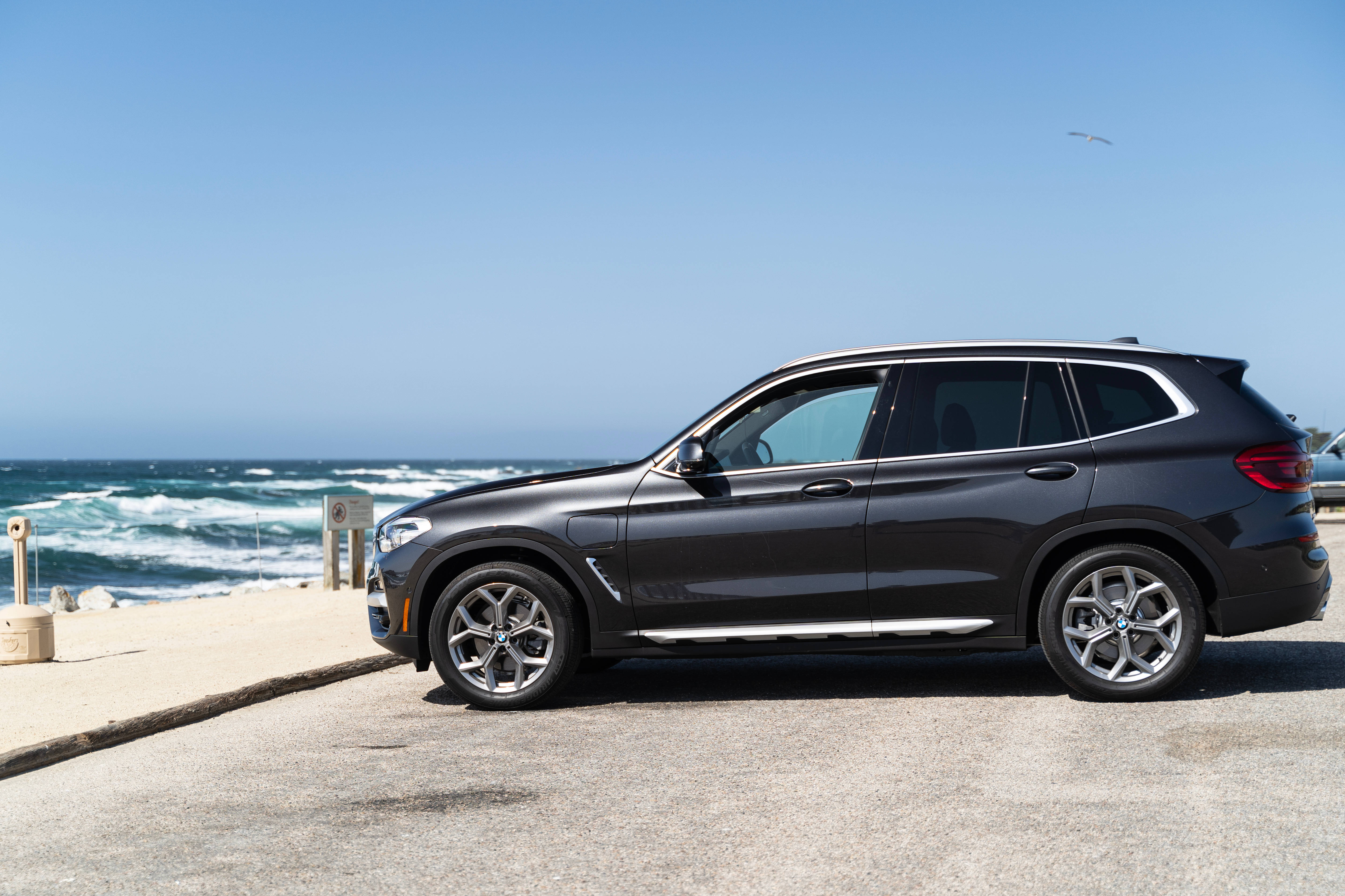 Black BMW, SUV, coastal road, 5K Desktop Wallpaper