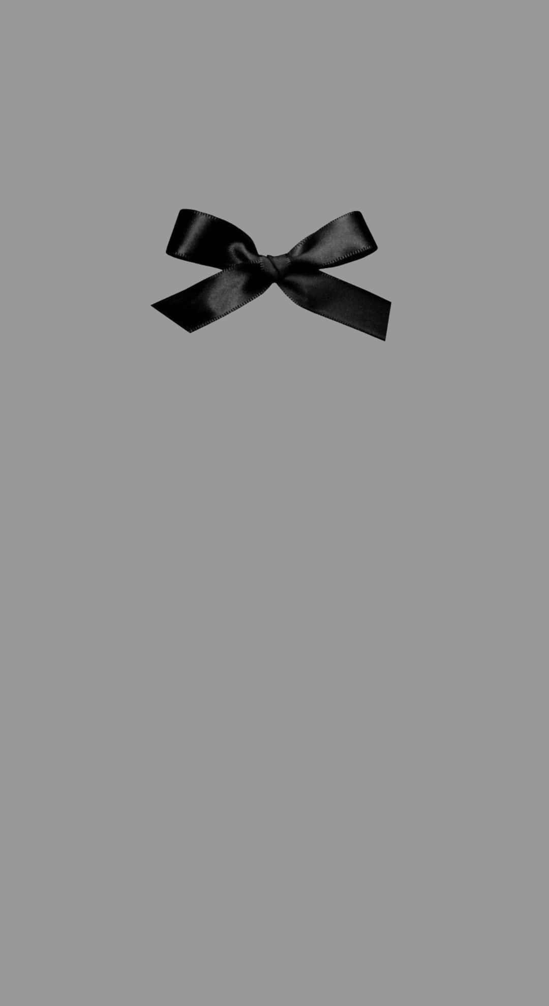 black satin bow, plain gray background, soft lighting, Full HD Phone Wallpaper