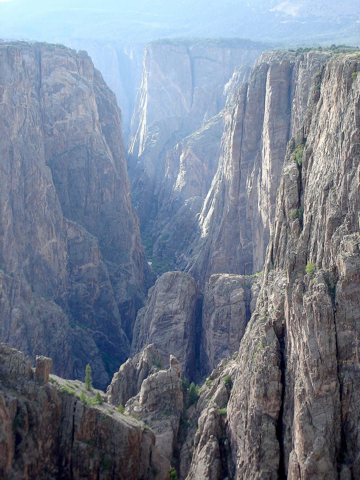 Black Canyon, towering rugged cliffs, deep shadows, HD Phone Wallpaper