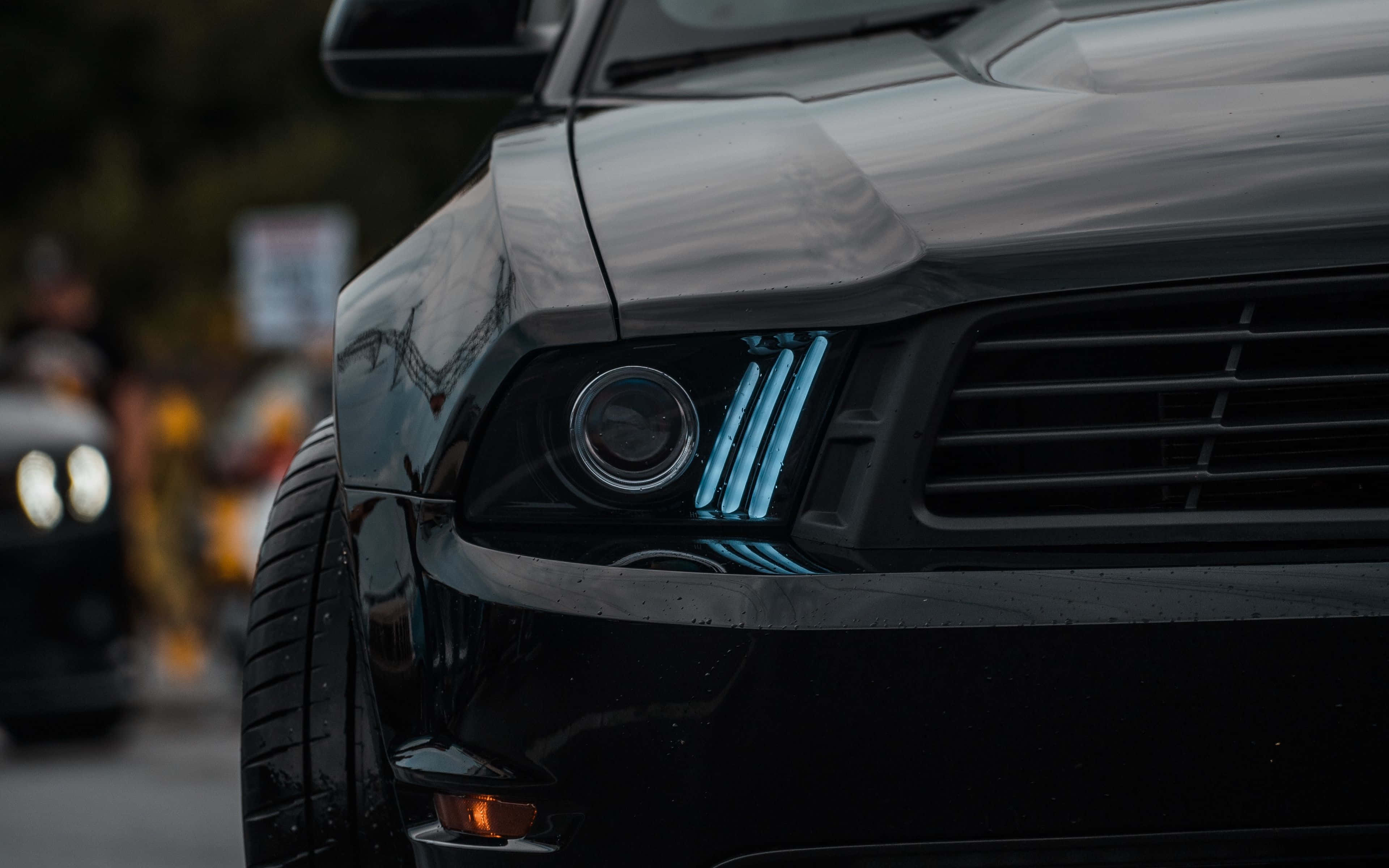 black car, sleek black car, glowing blue accents, 4K Desktop Wallpaper