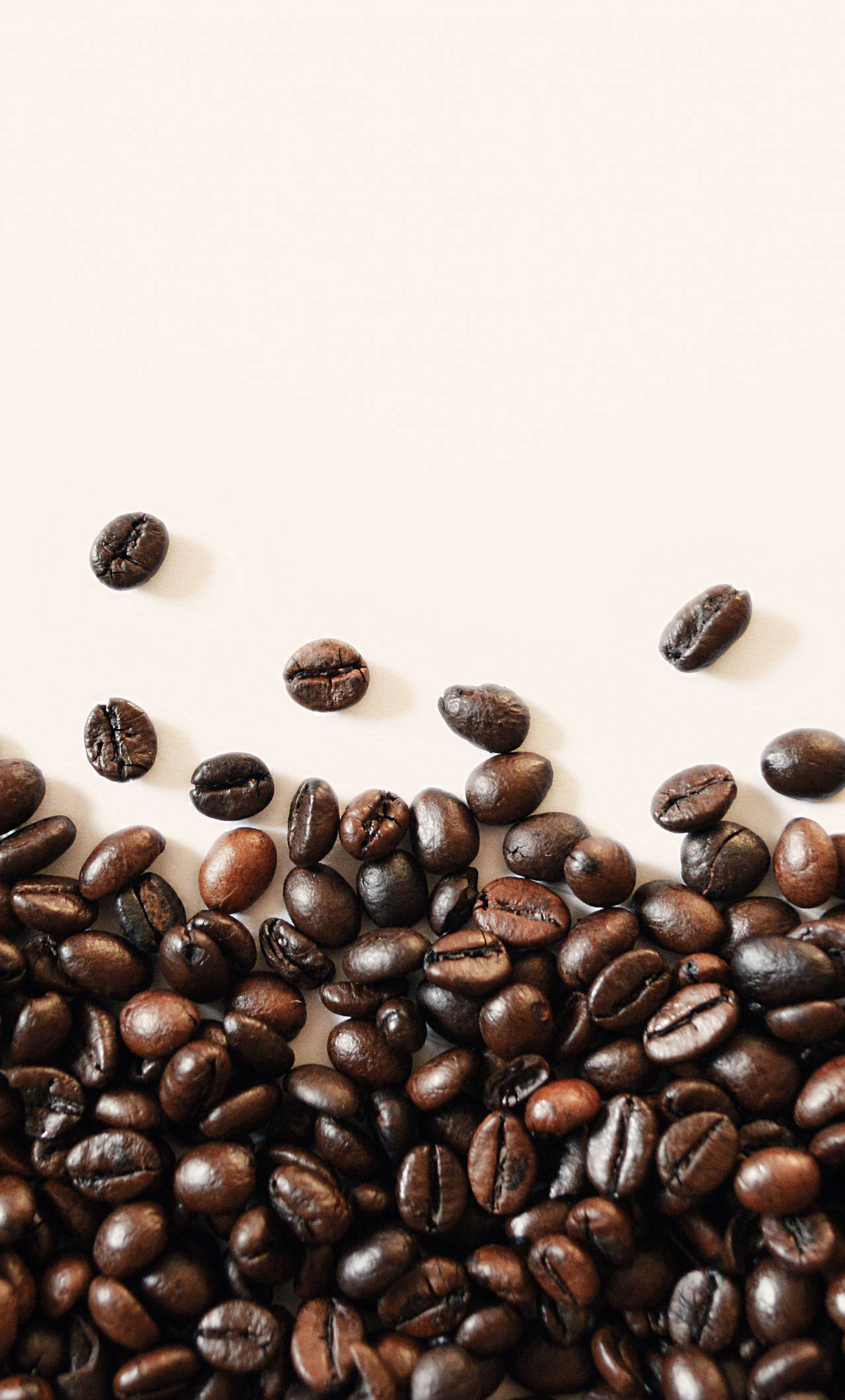 dark roasted coffee beans, beige surface, textured, Full HD Phone Wallpaper