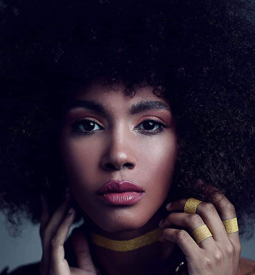 young black woman model, afro hair, bold gold glitter accessories, SD Phone Wallpaper