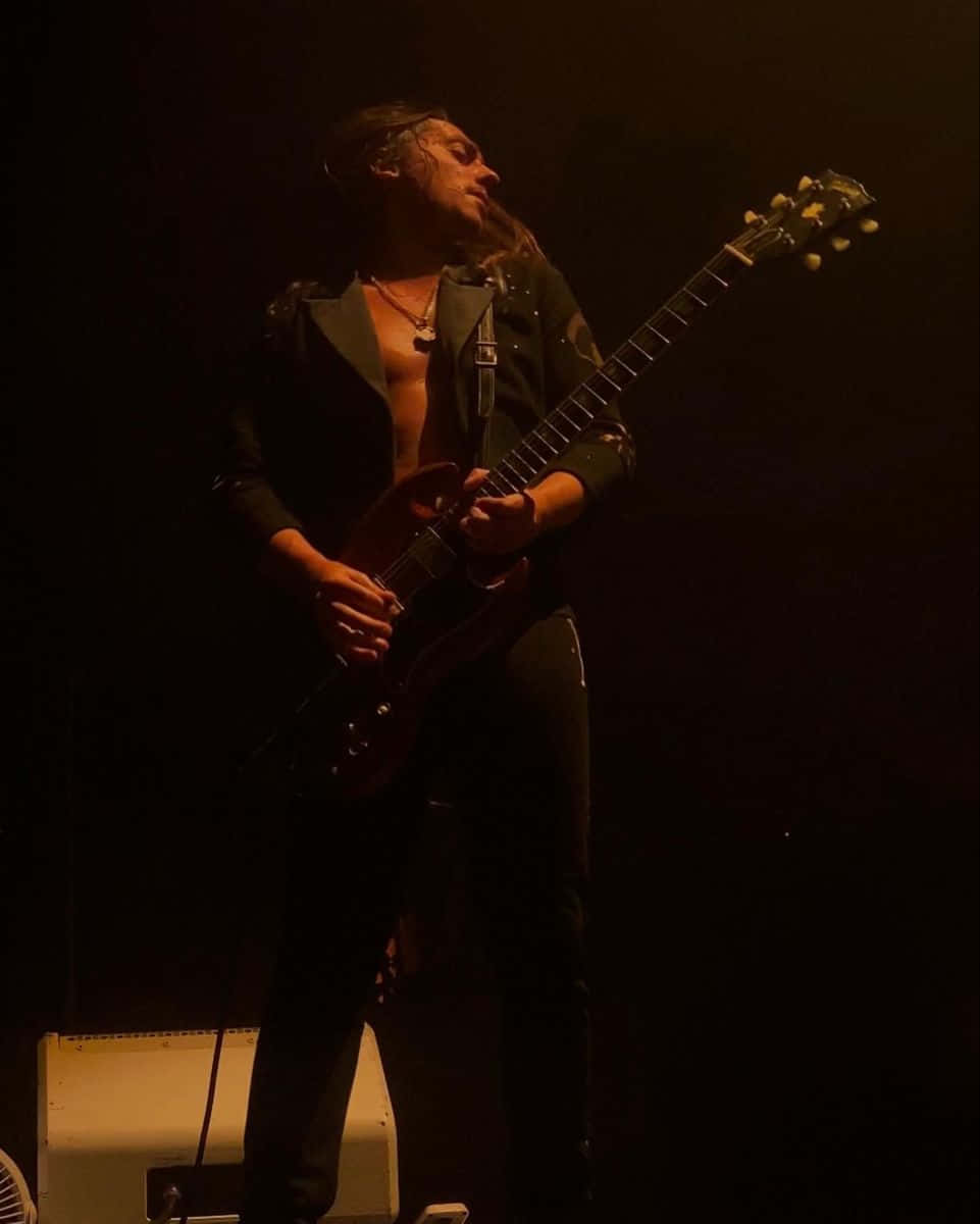 Black Flag Band, red electric guitar, warm stage lights, SD Phone Wallpaper