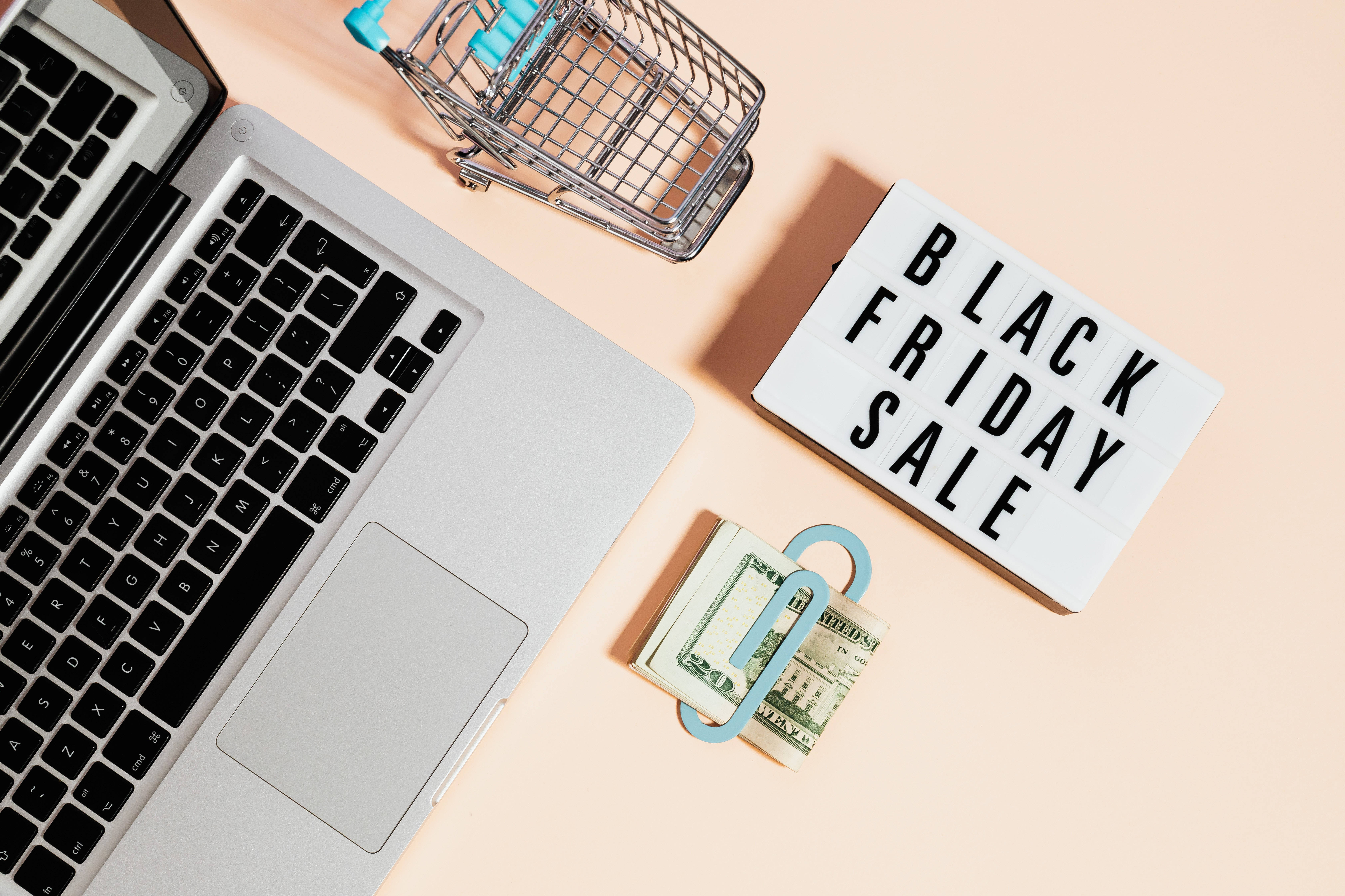 Black Friday Sale, pastel pink surface, laptop shopping cart, 5K Desktop Wallpaper