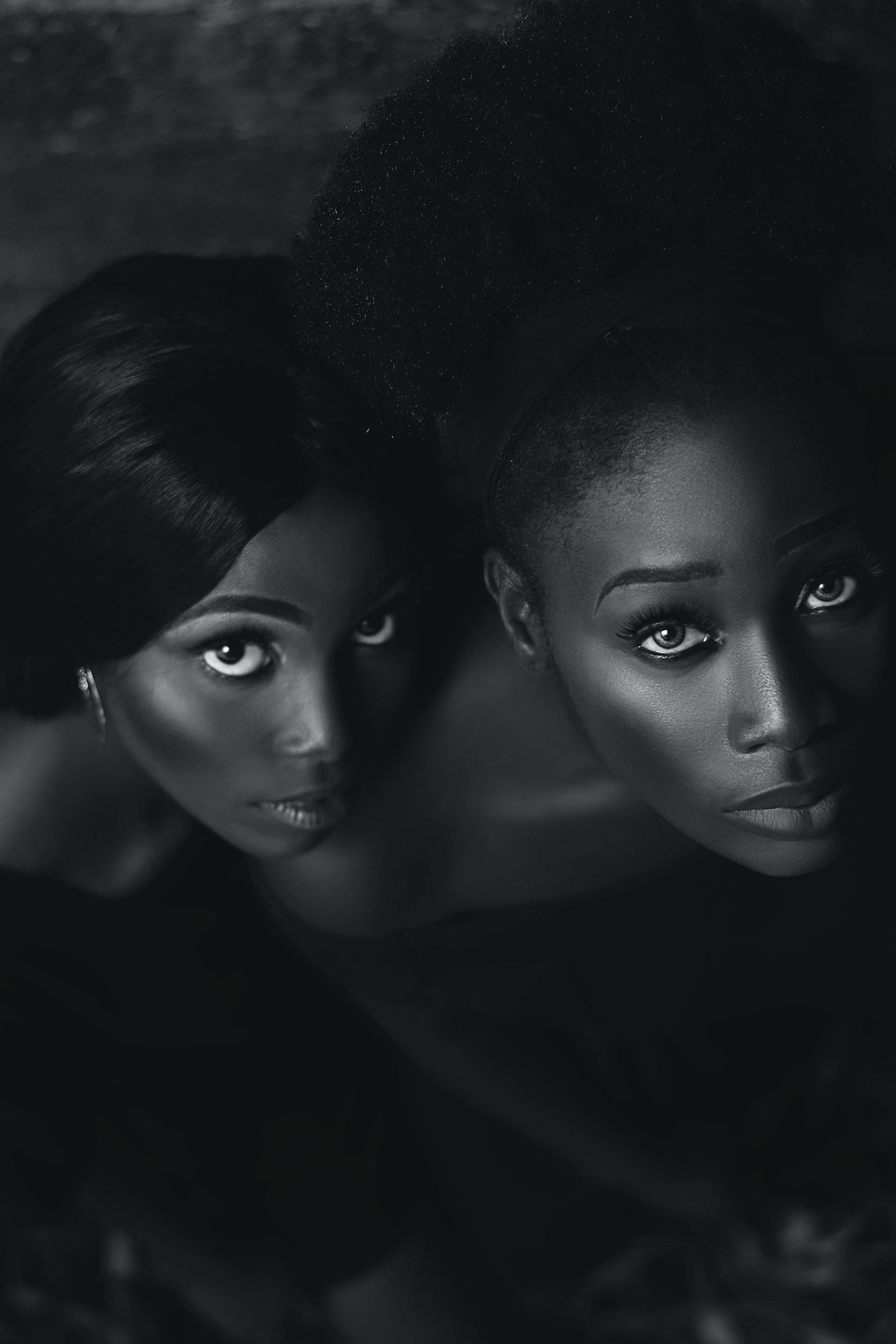black women, striking eyes, shadowed depths, 2K Phone Wallpaper