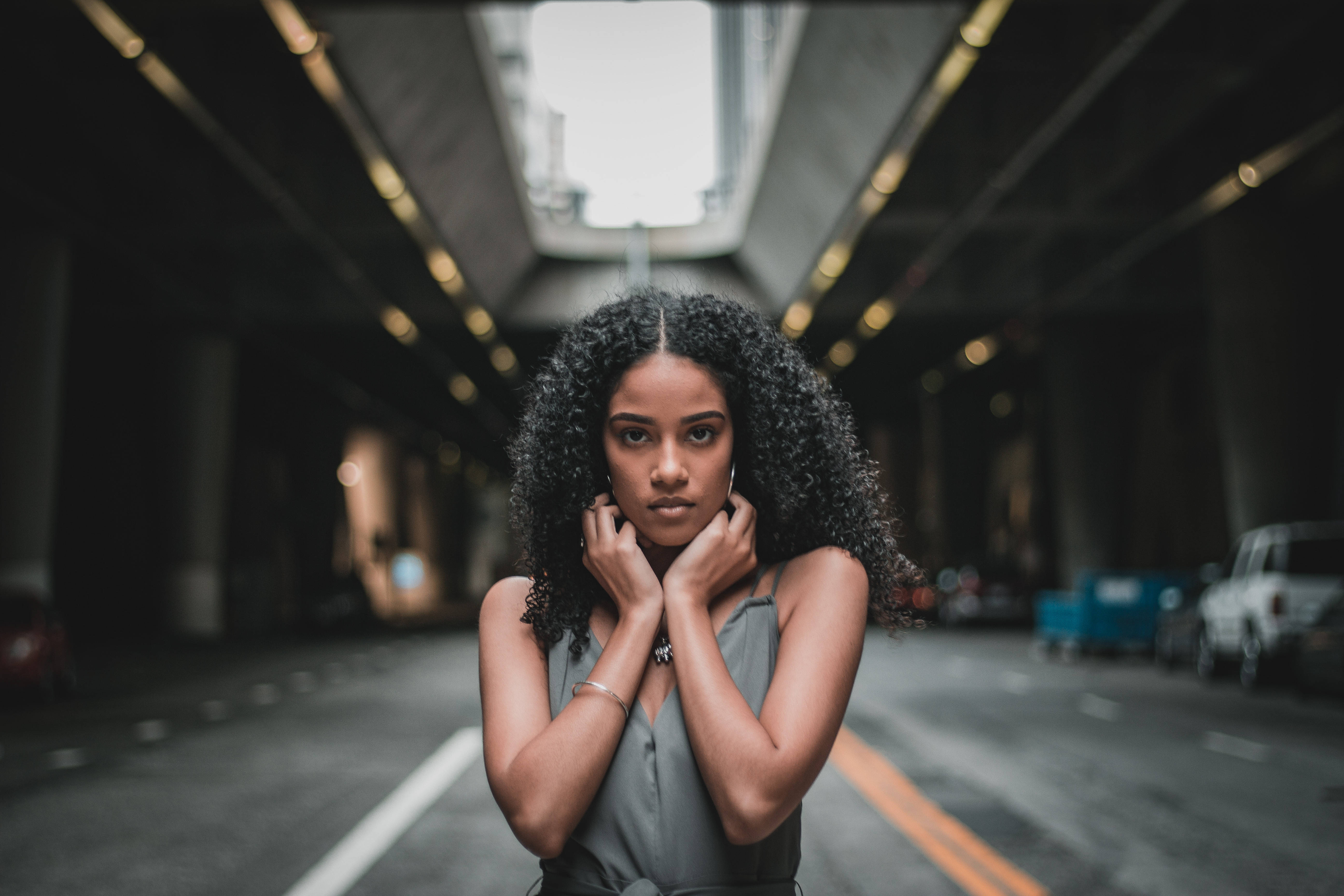 Black Girl, curly hair, dim urban tunnel, 5K Desktop Wallpaper
