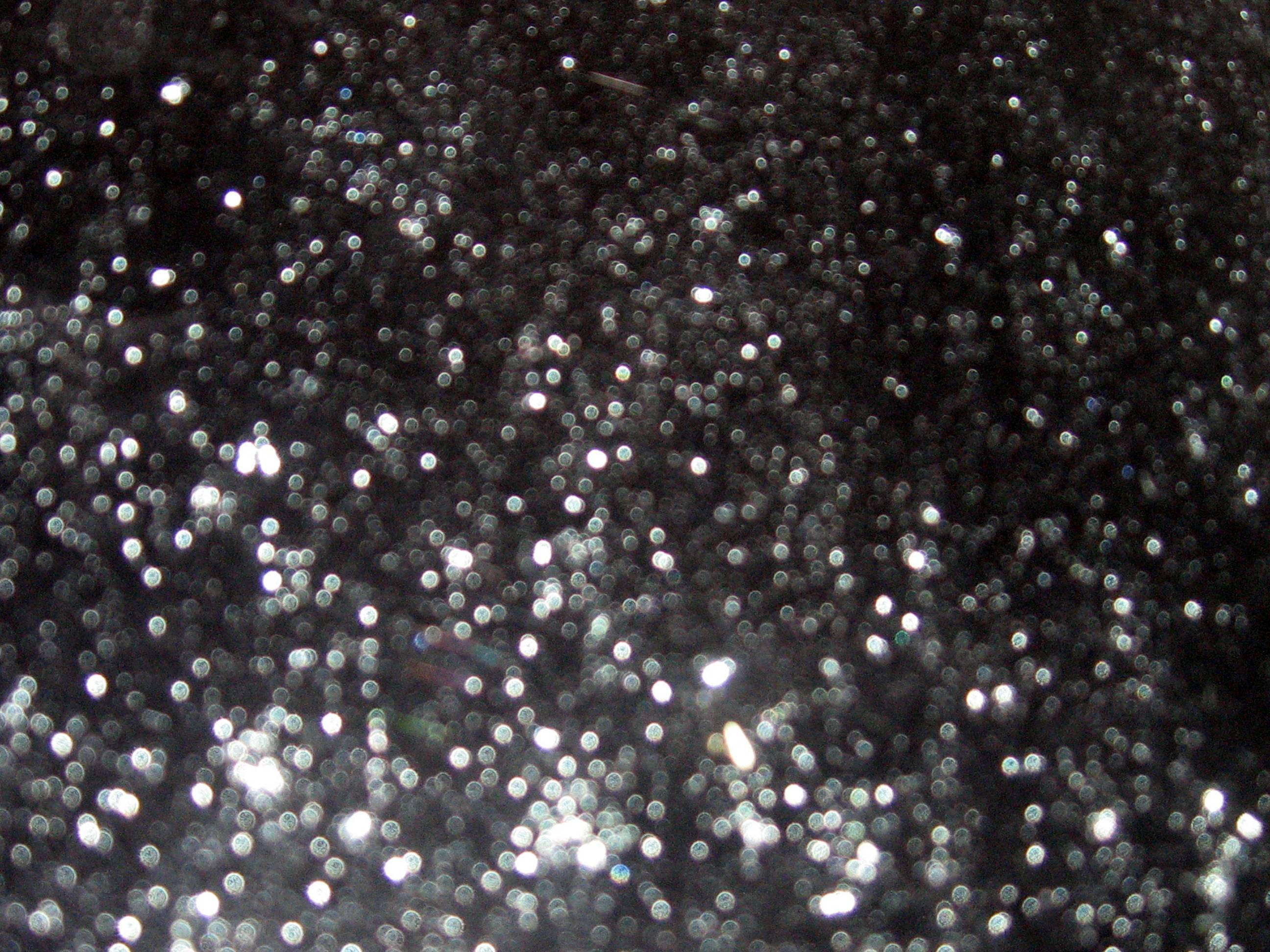 black glitter, shimmering silver glitter, dark surface, 2K Desktop Wallpaper