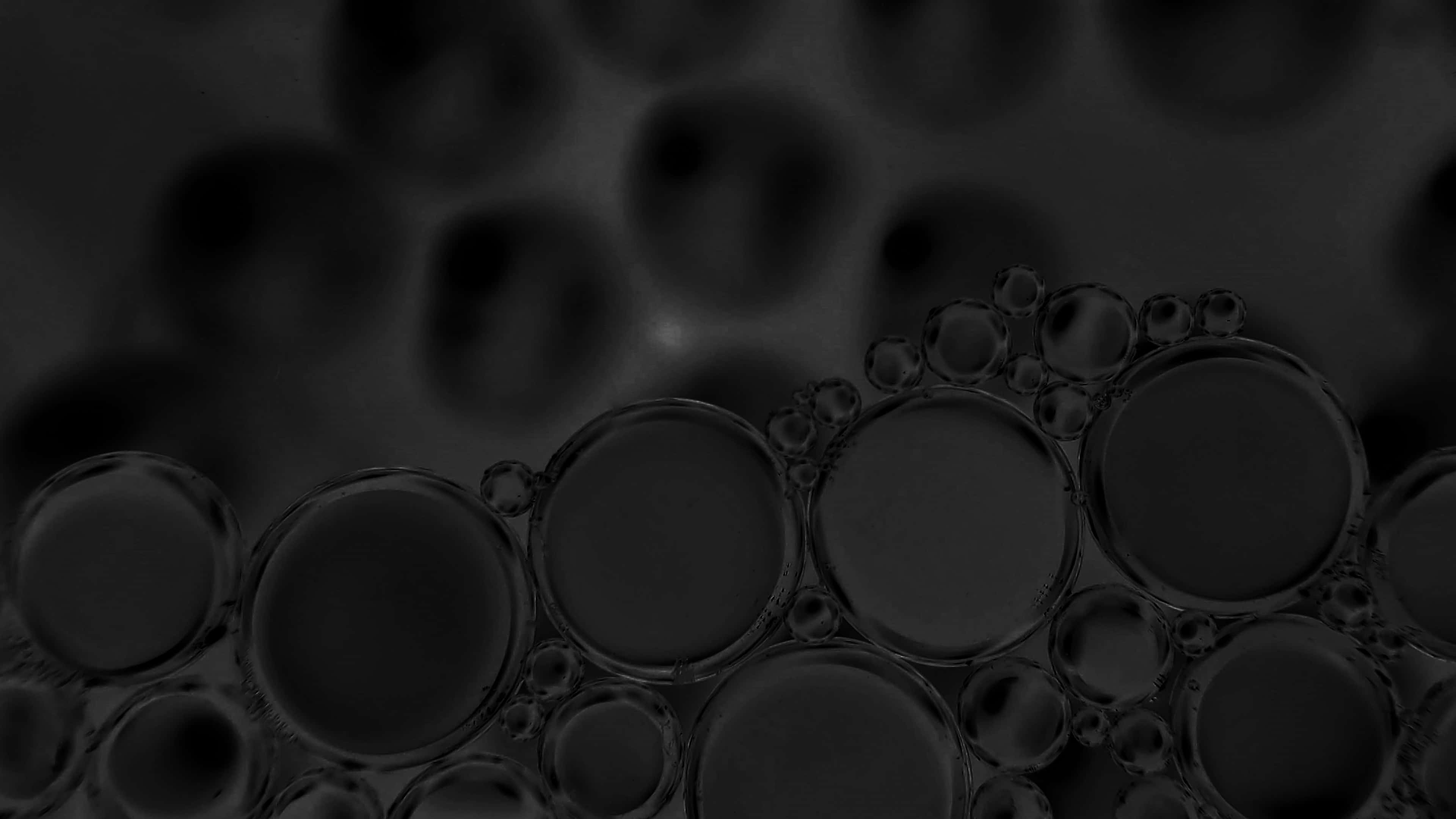 glossy black bubbles, soft focus, reflective highlights, 4K Desktop Wallpaper