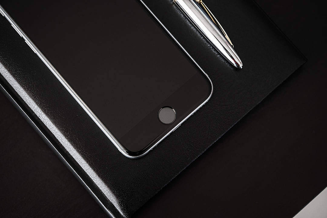 black leather surface, textured black leather, silver pen, SD Desktop Wallpaper