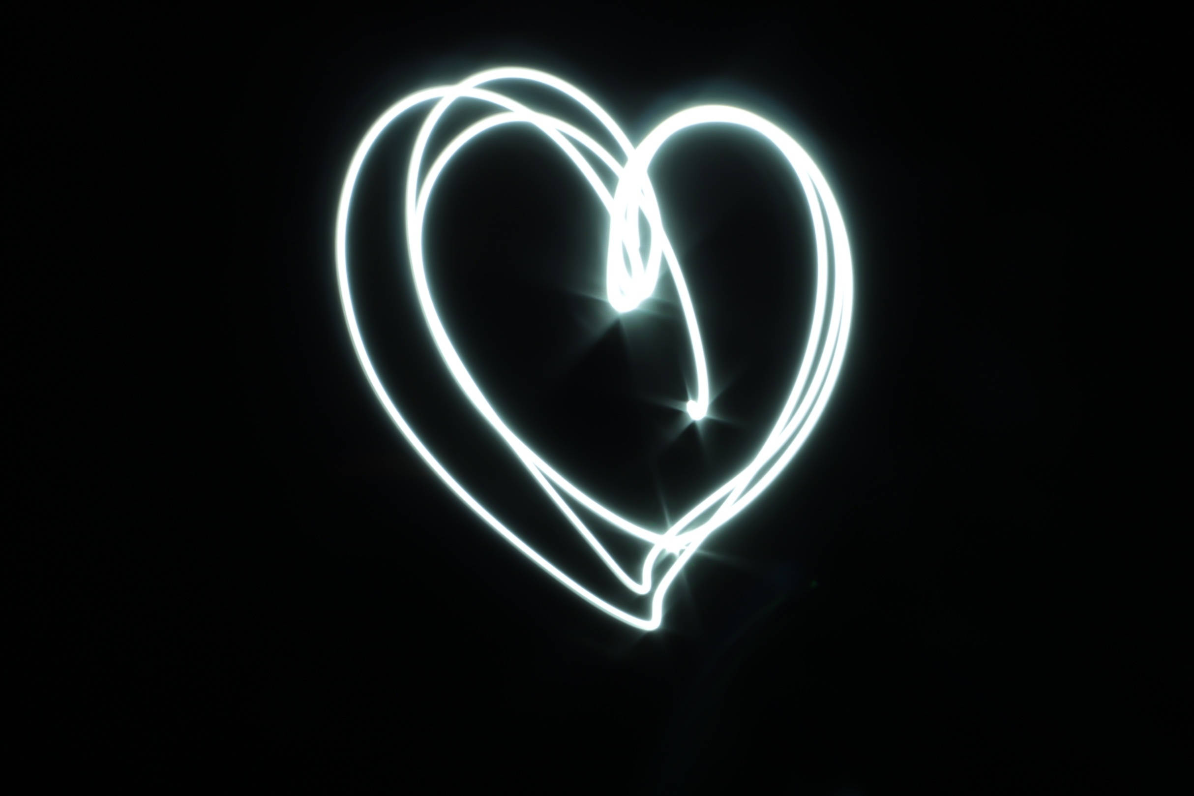 glowing white heart, light trails, pure black background, Full HD Desktop Wallpaper