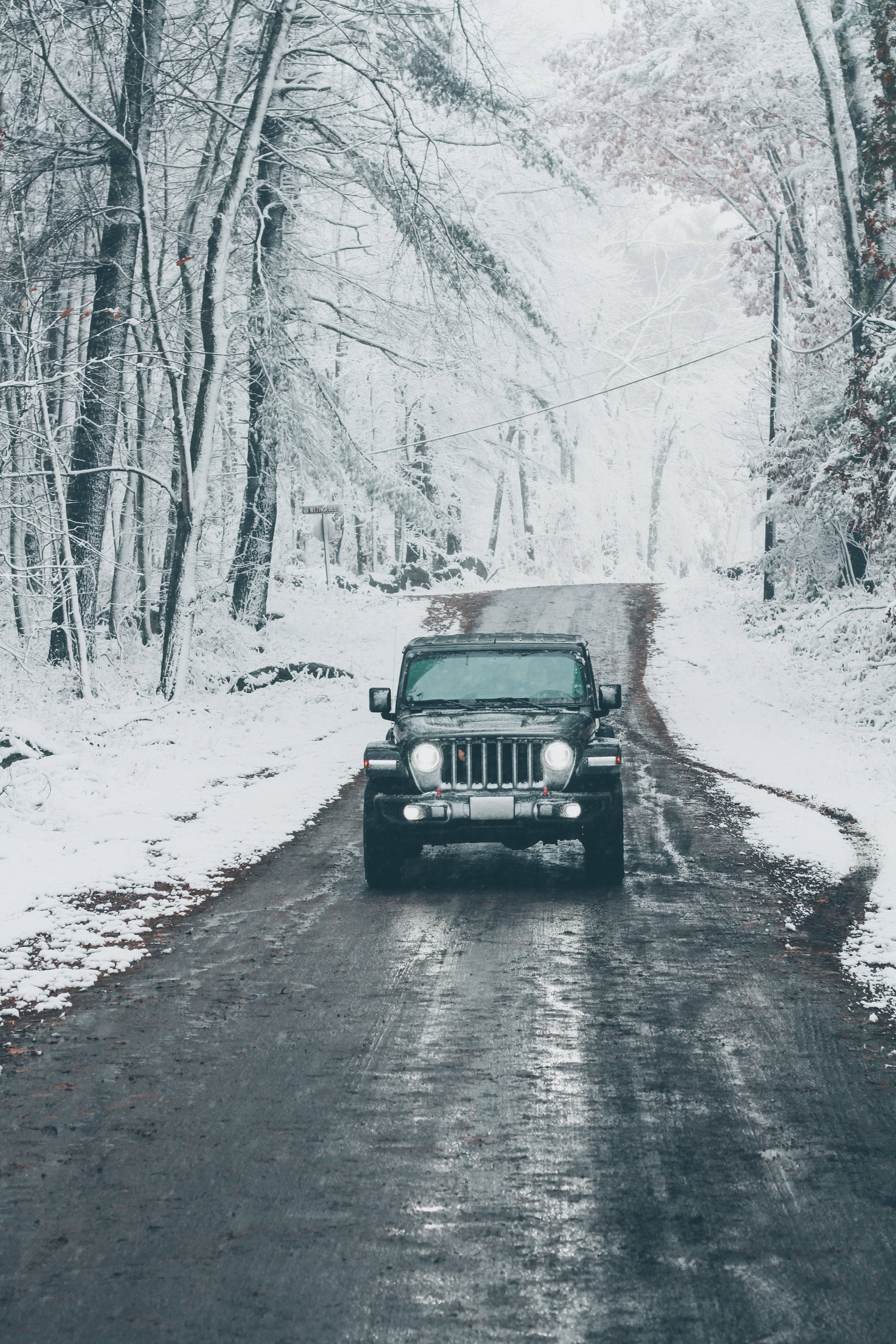 black jeep, snowy forest, snow-lined forest road, 5K Phone Wallpaper